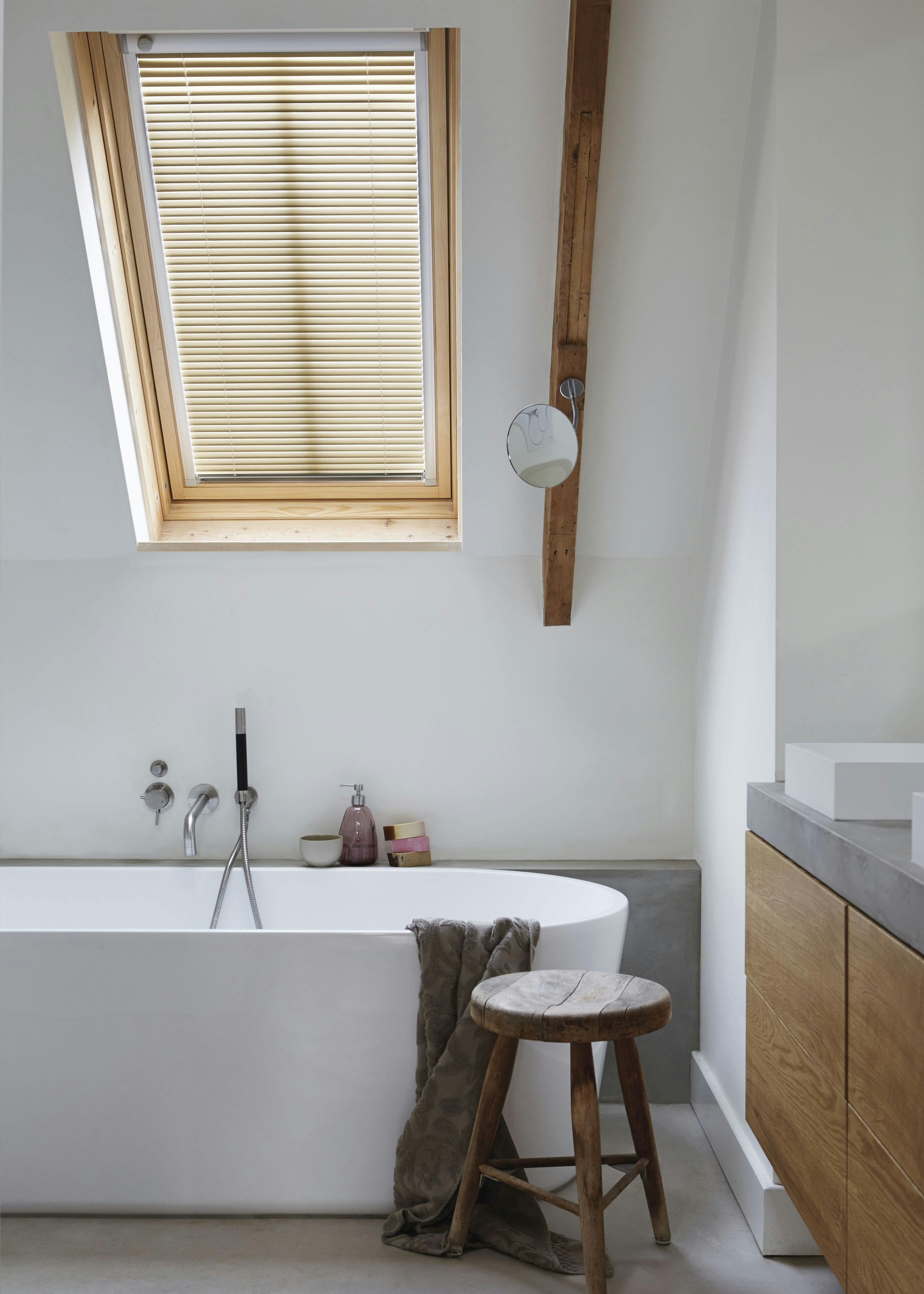 bathroom with wood venetian blinds