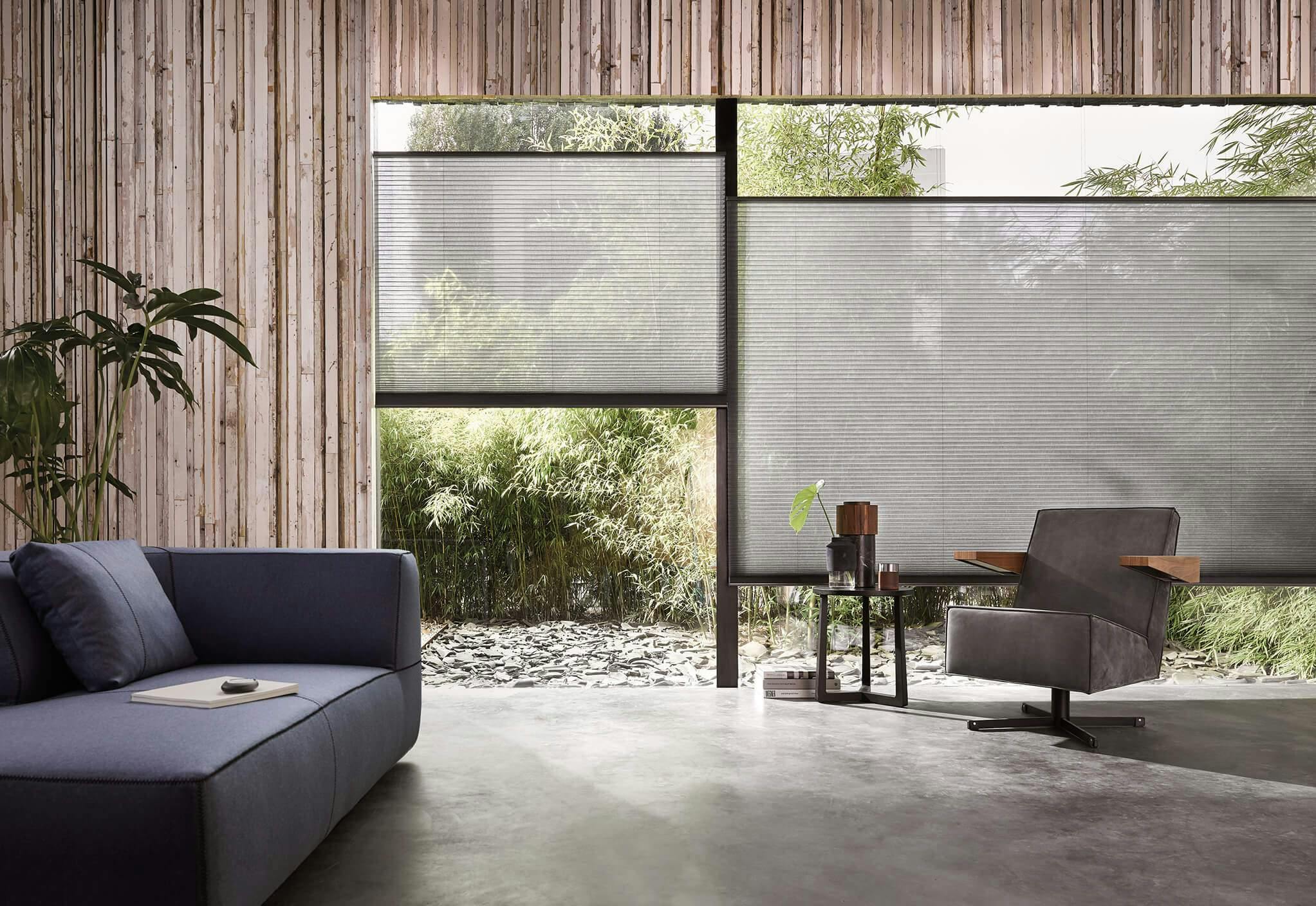 living room with grey duette shades