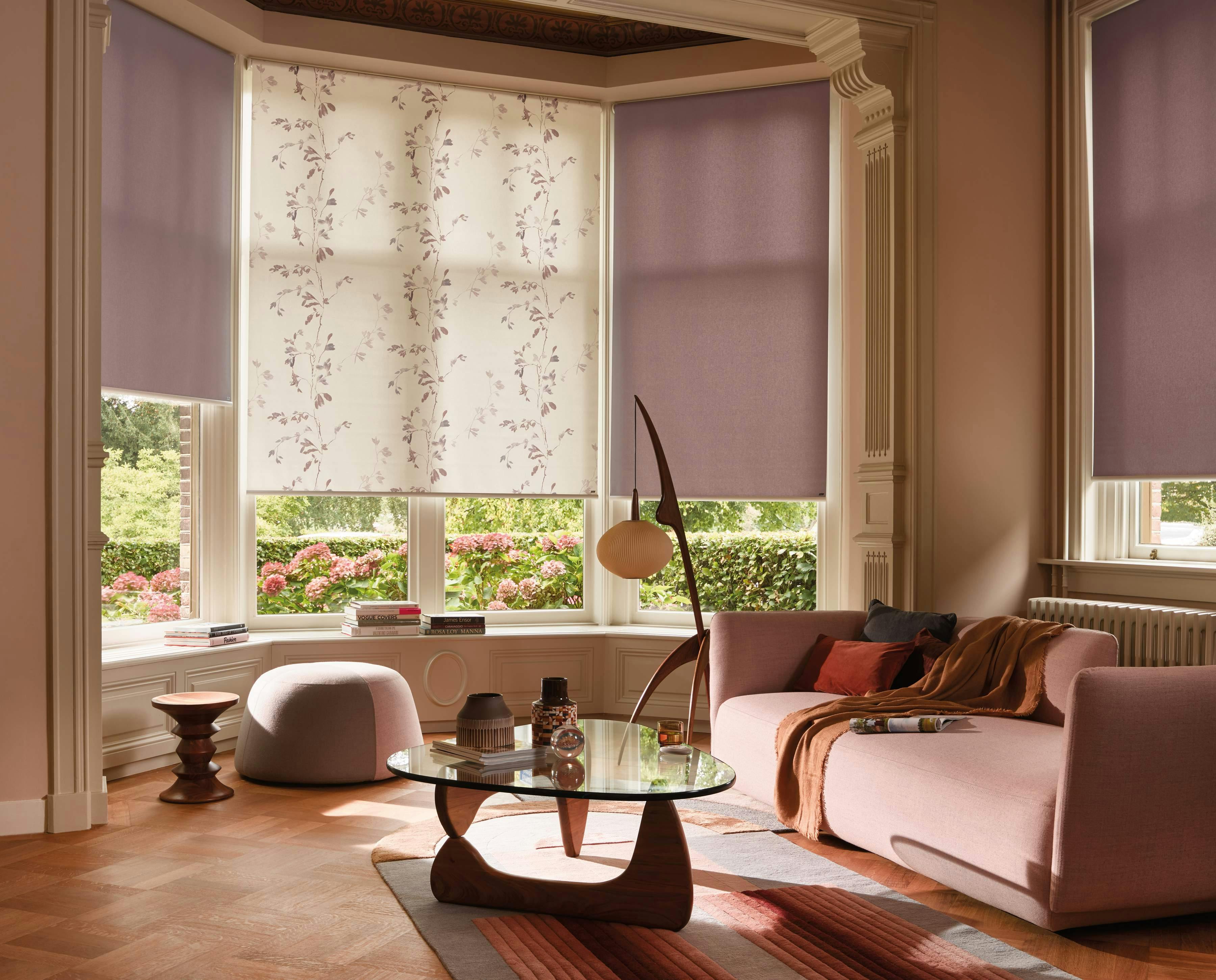 Living room with purple and patterned Roller blinds