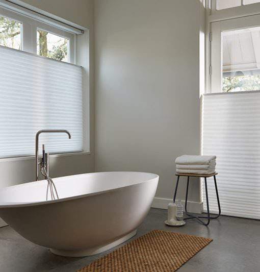 white bathroom with white Duette® blinds