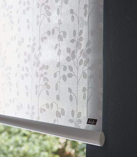 Roller blind with white translucent floral design