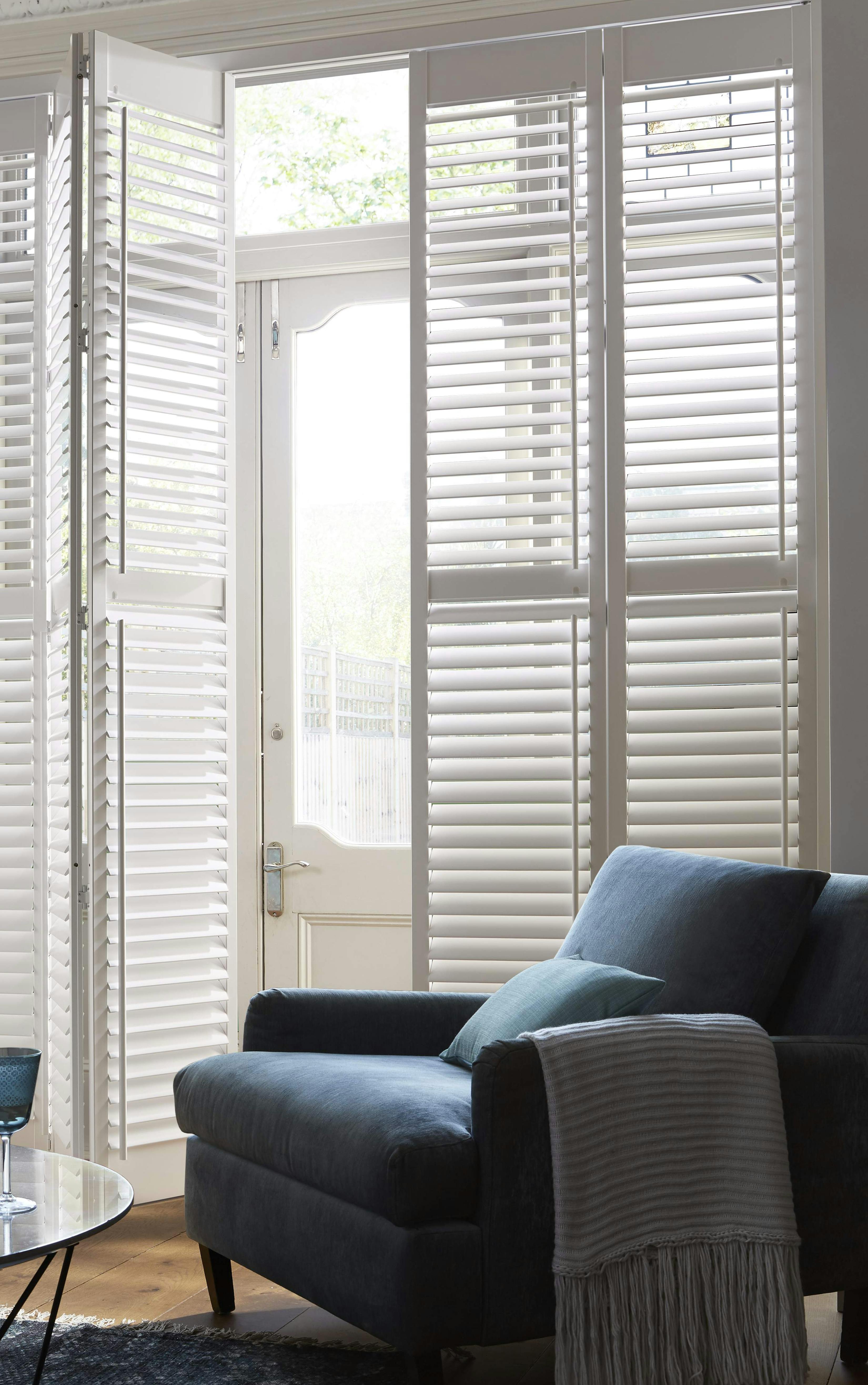 White Shutters on a patio door