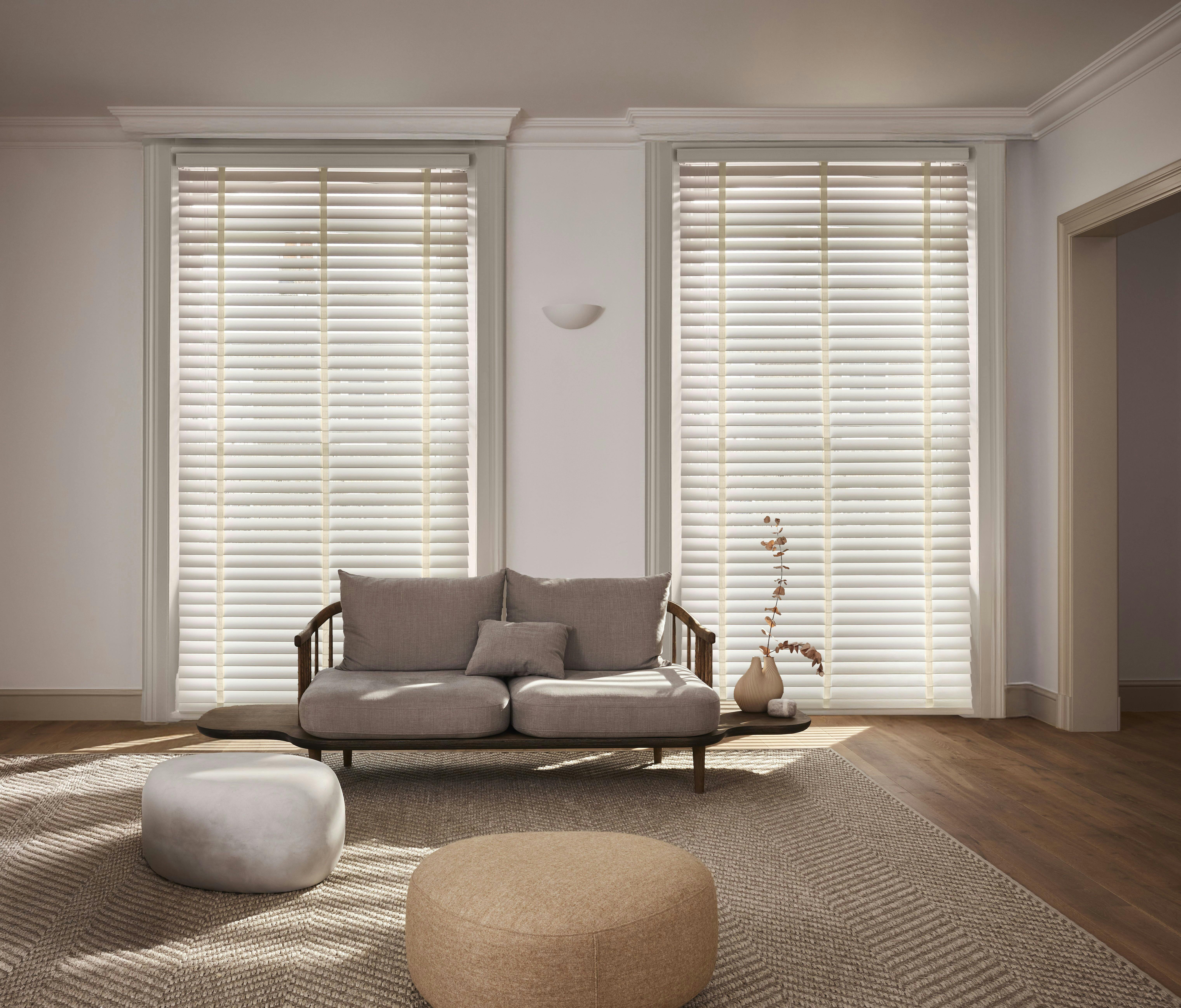 Cream venetian blinds with cream woven tapes in a modern living room