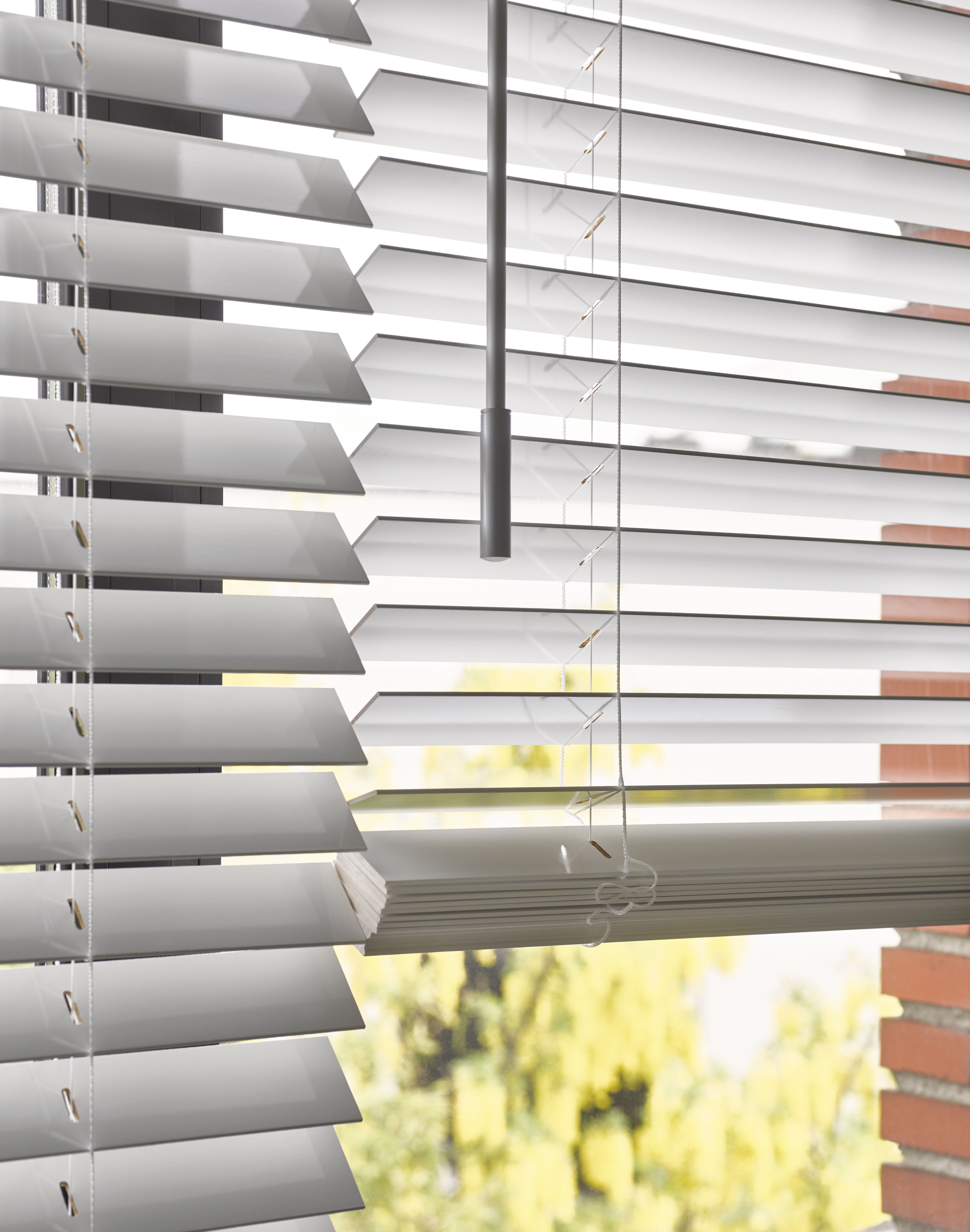 Closeup of white wood blinds 