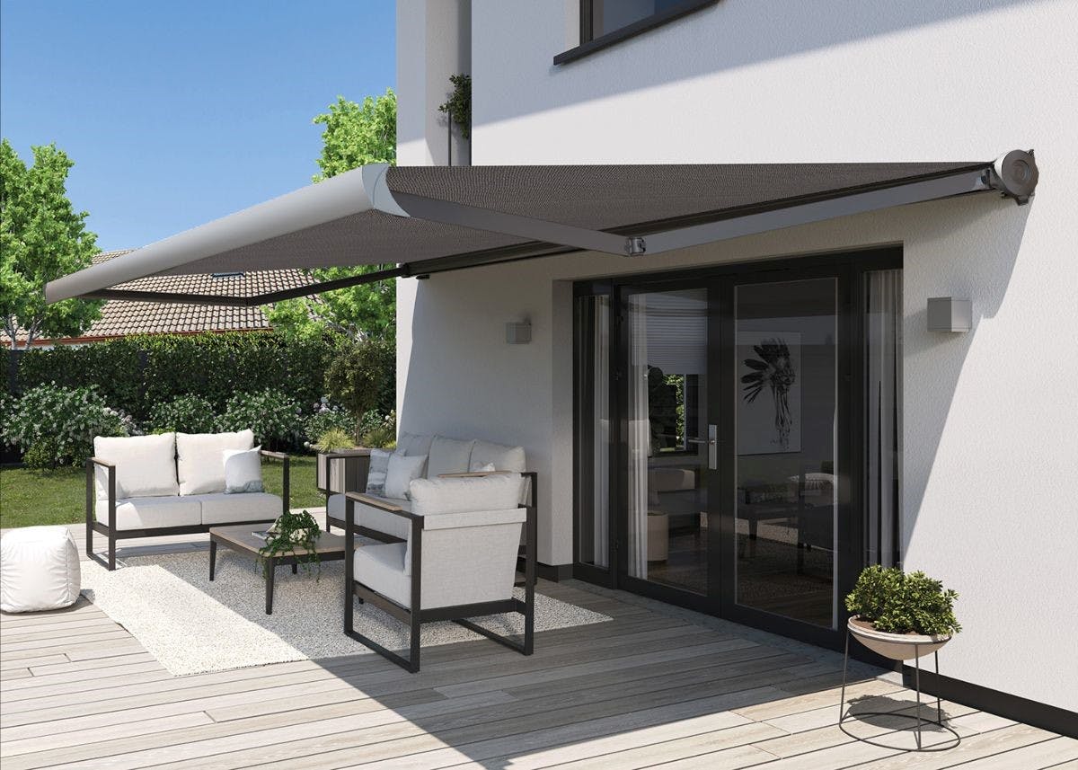 Grey patio awning on a white house