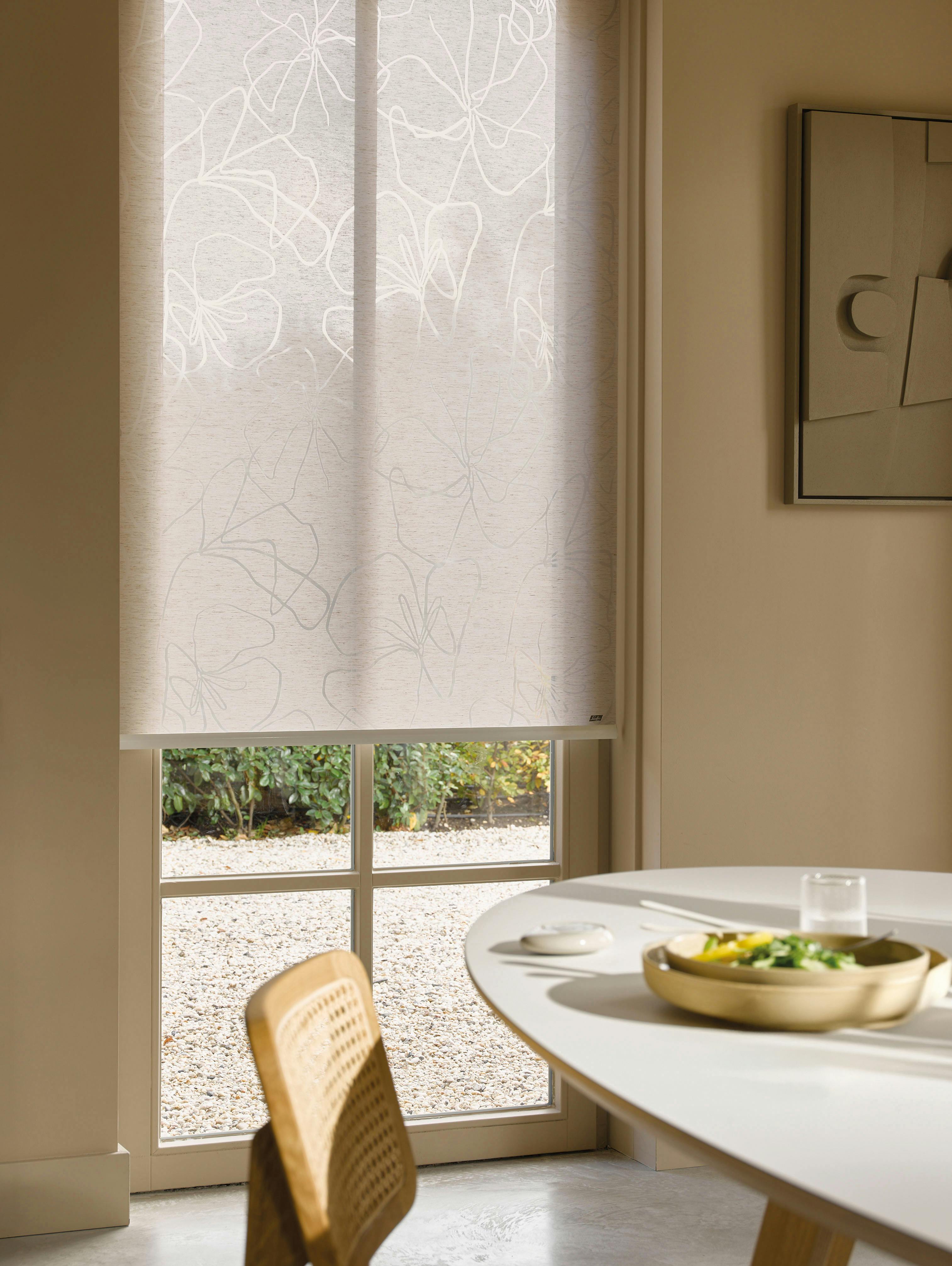 White roller blinds in a dining room