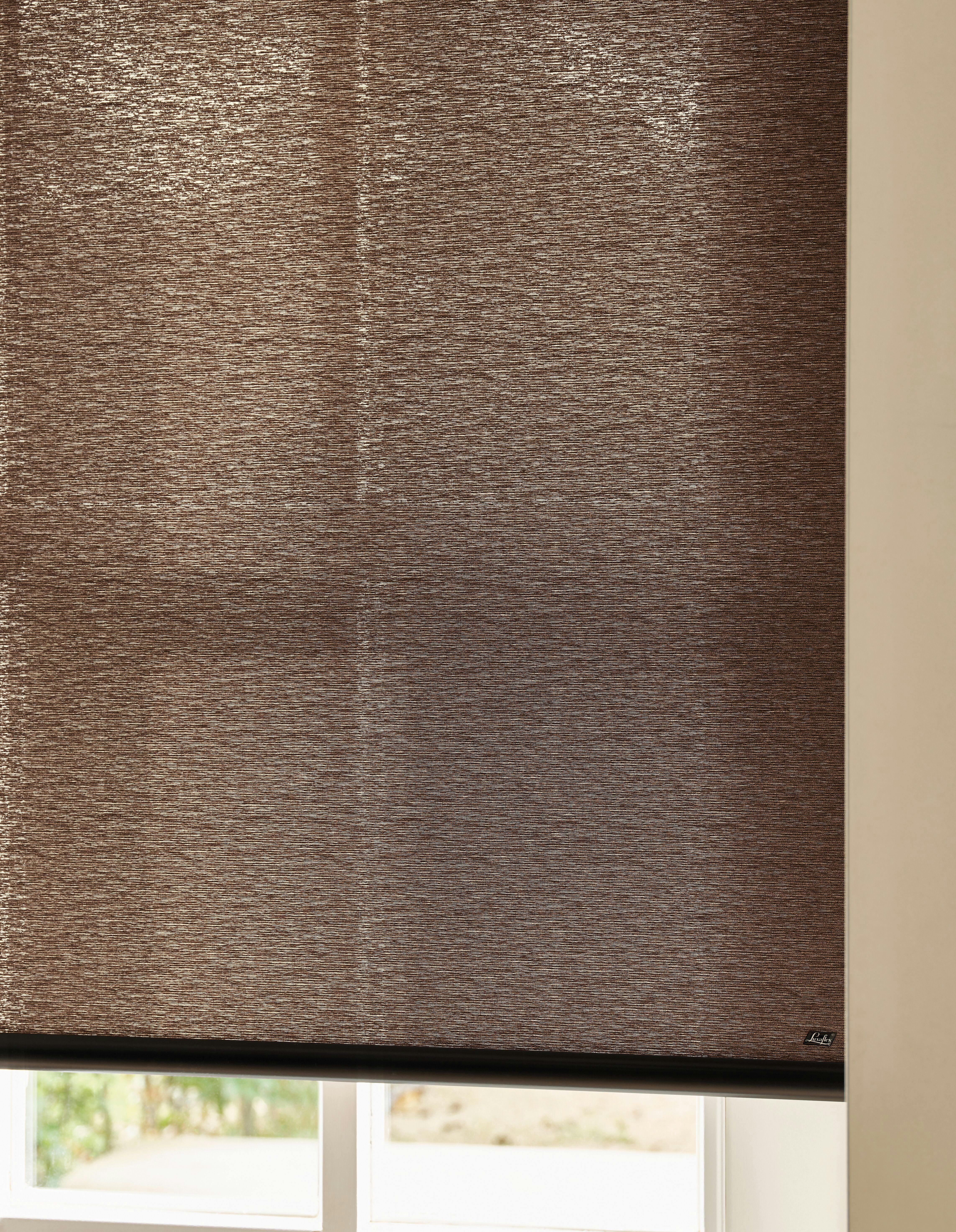 Closeup of brown roller blinds 