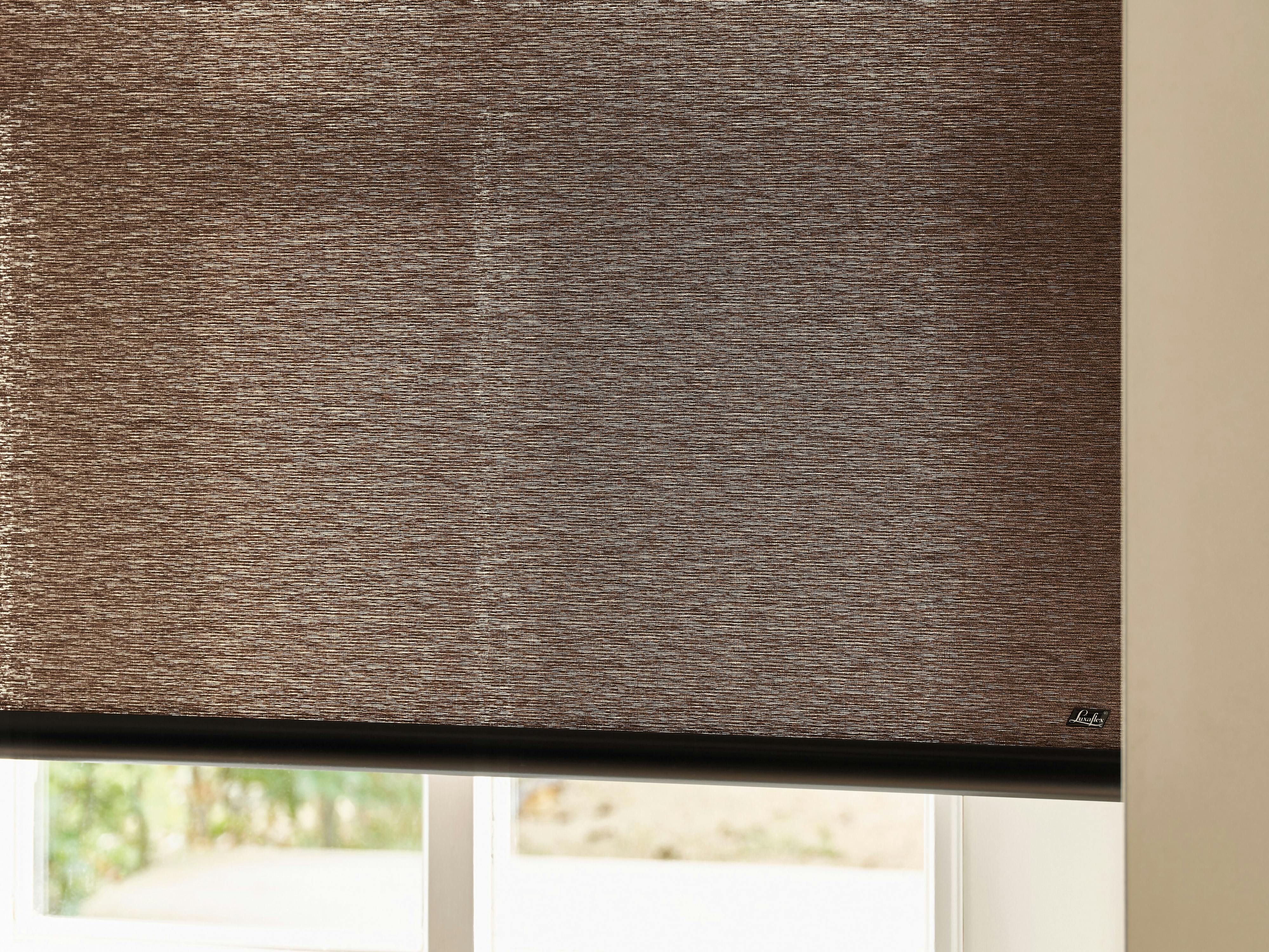 Closeup of brown roller blinds