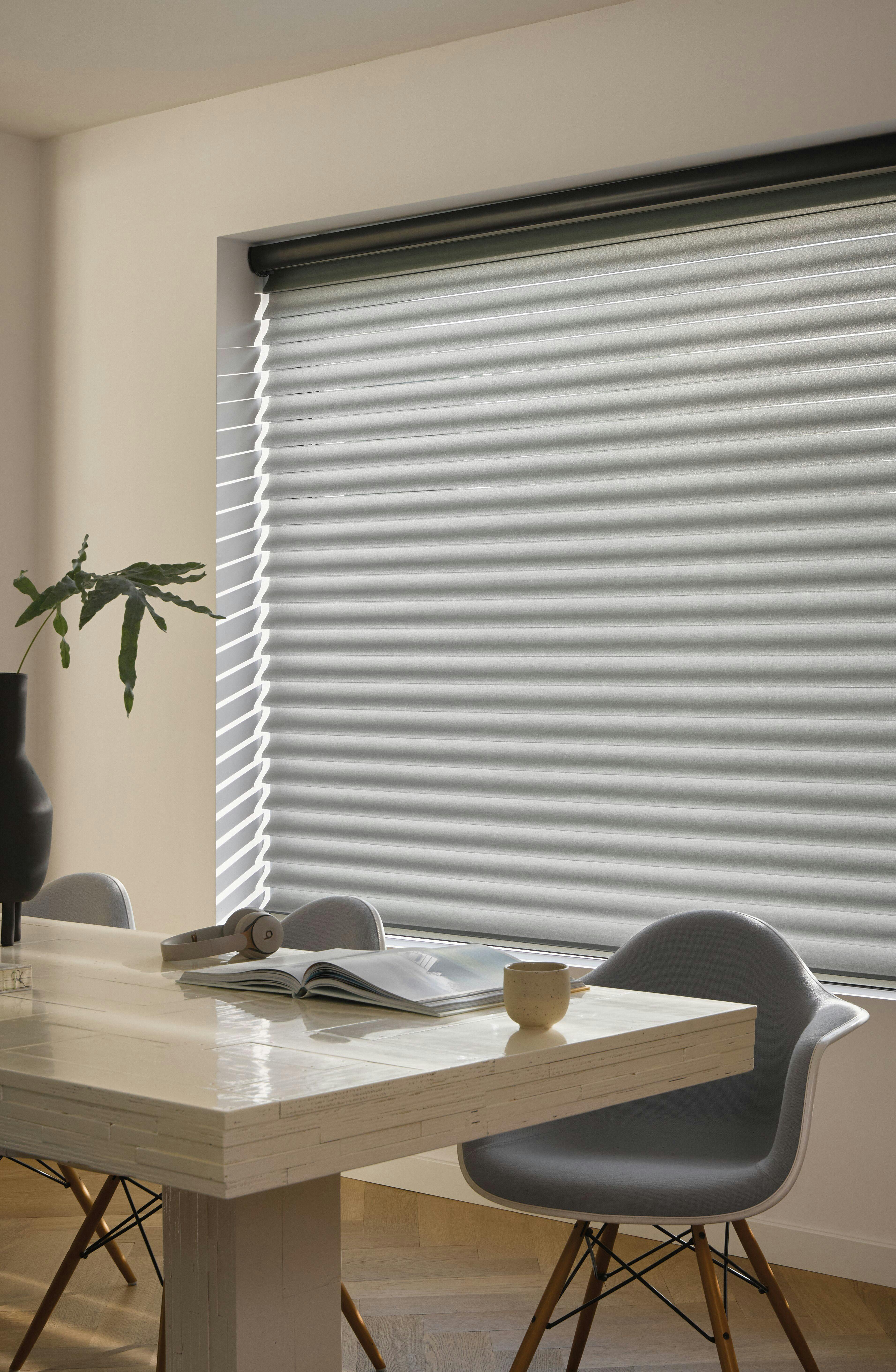 Silhouette® blinds in a closed position in a dining room