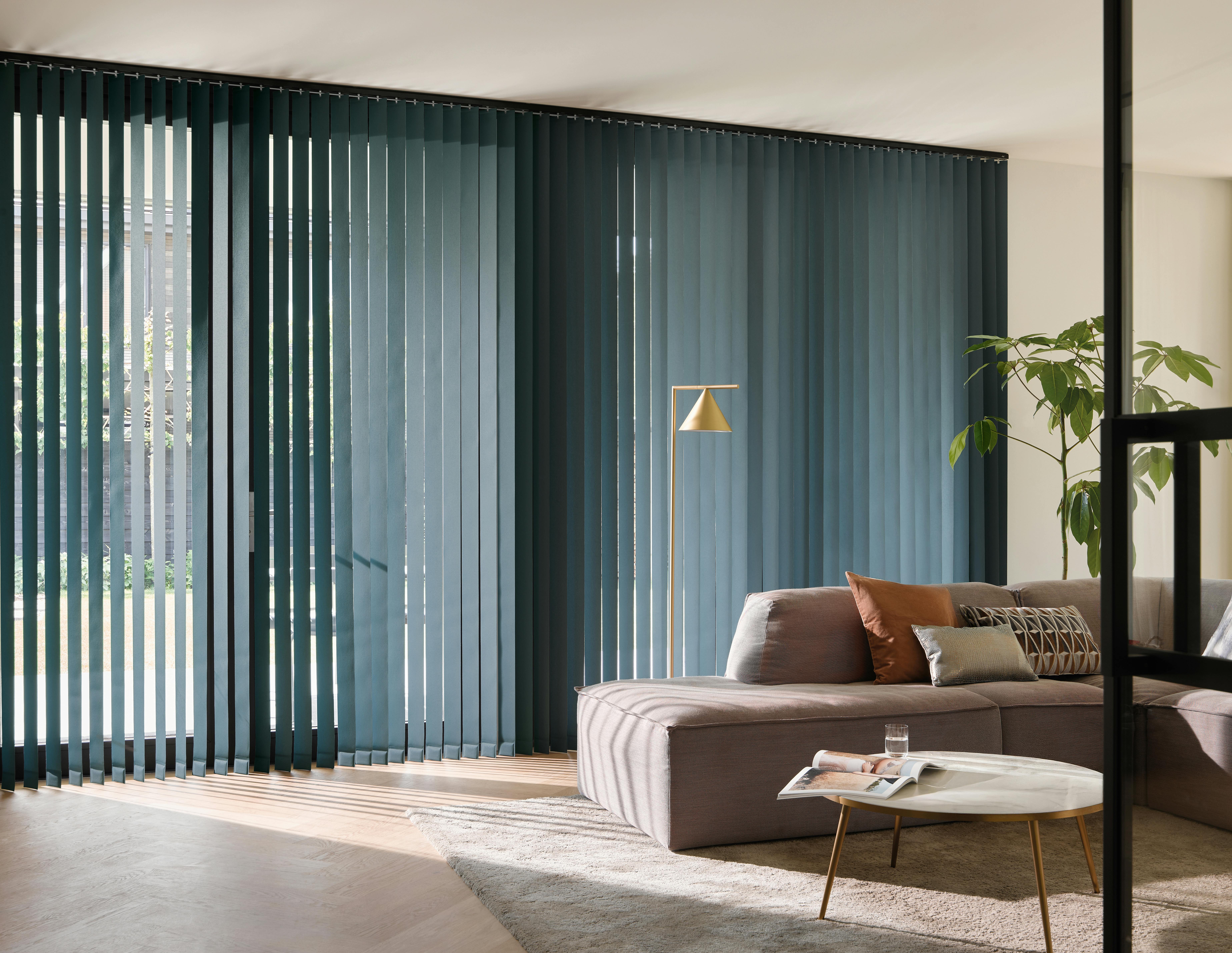 Blue vertical blinds in a living room 