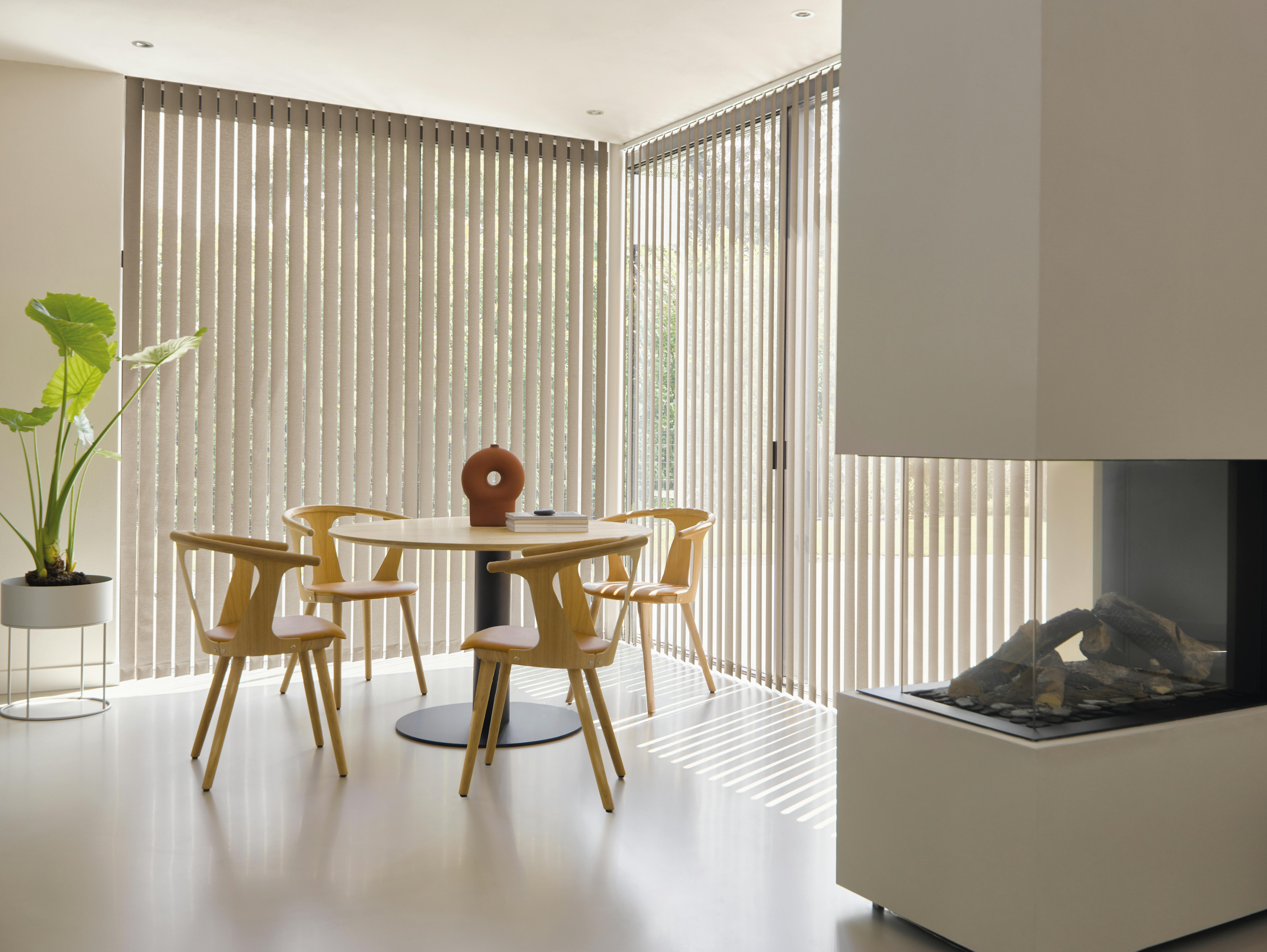 Light brown vertical blinds in a living room 