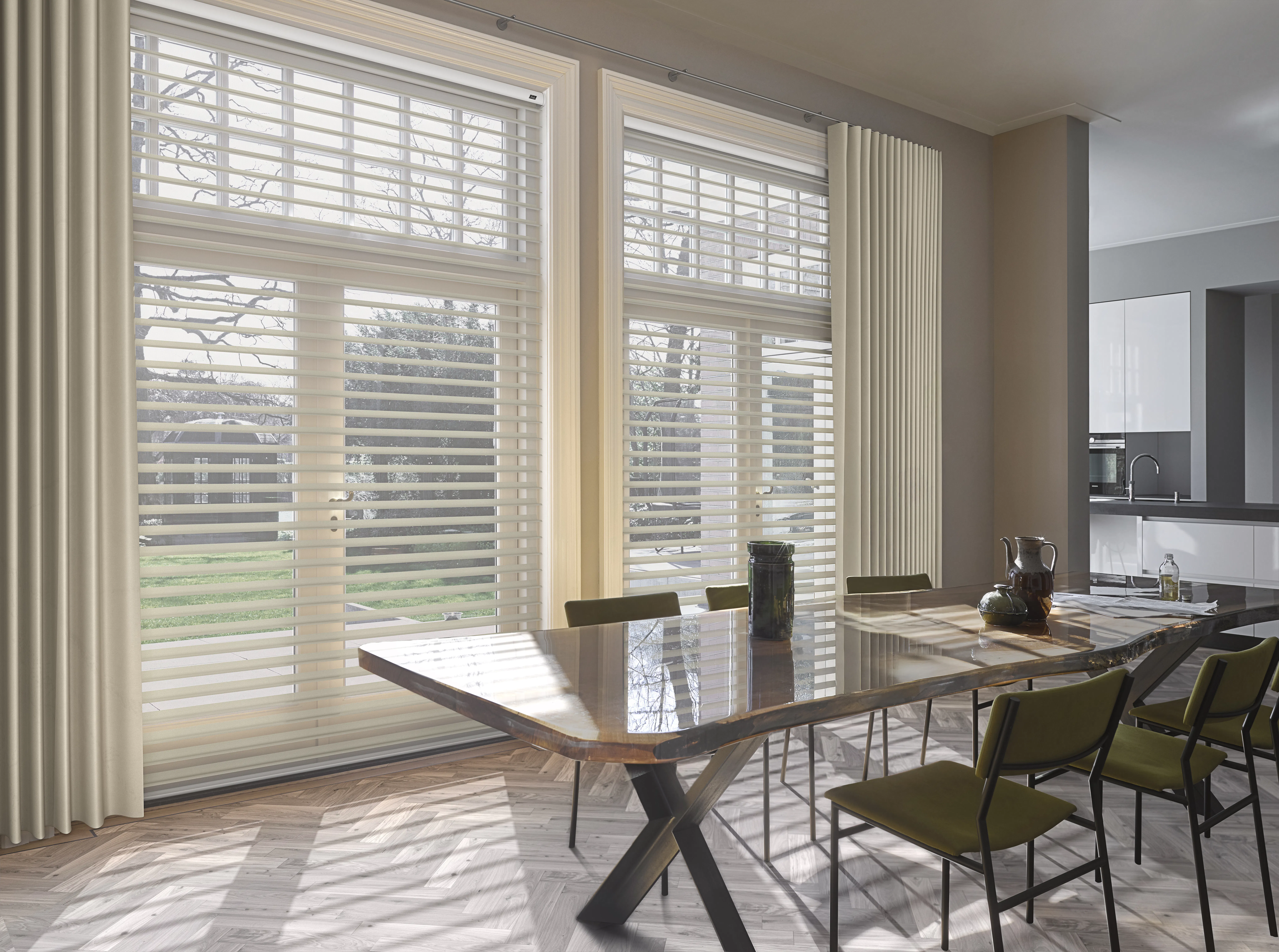 Cream silhouette shades layered with cream curtains by glass doors in a dining room
