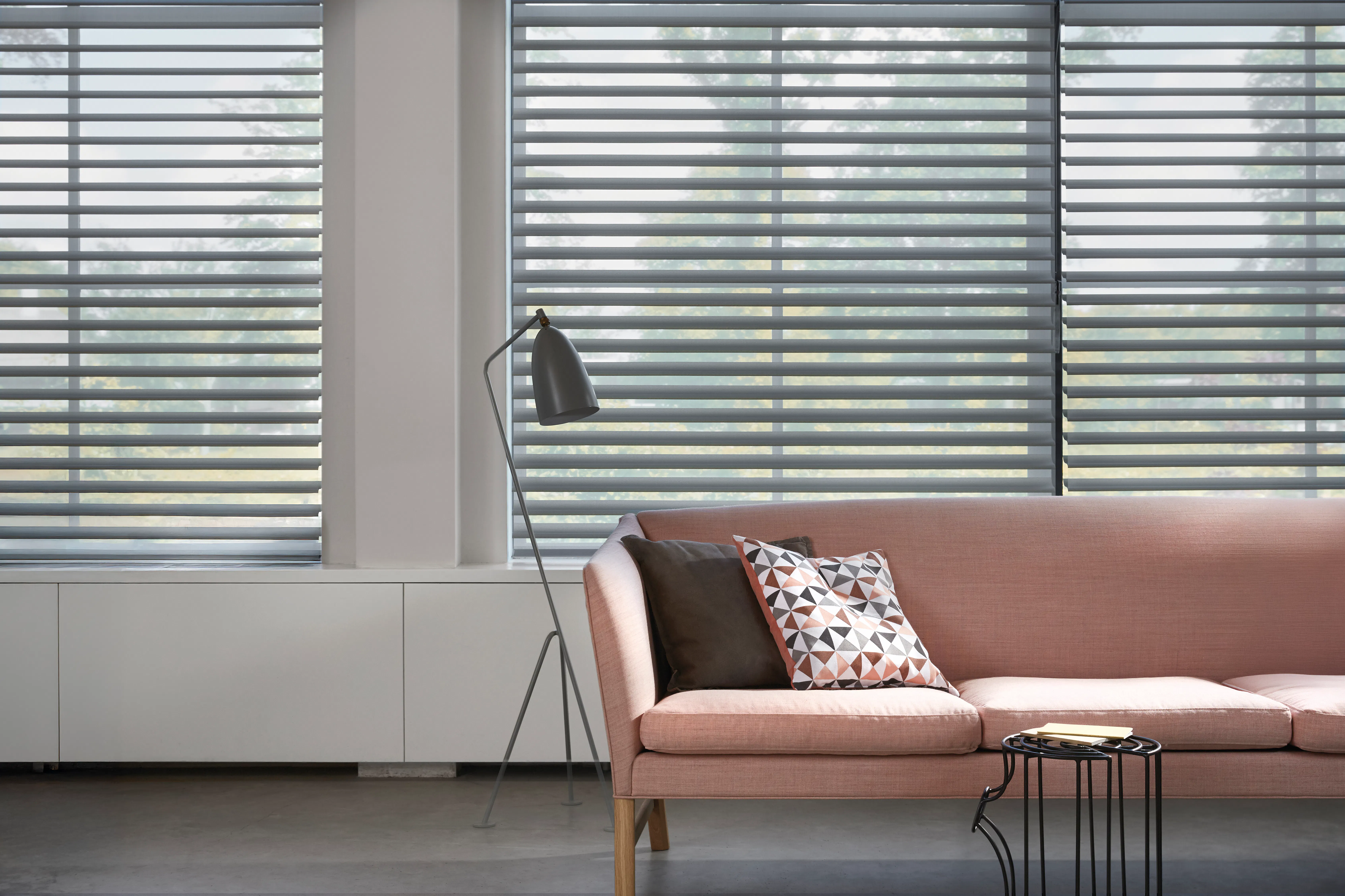 Grey silhouette shades in a living room 