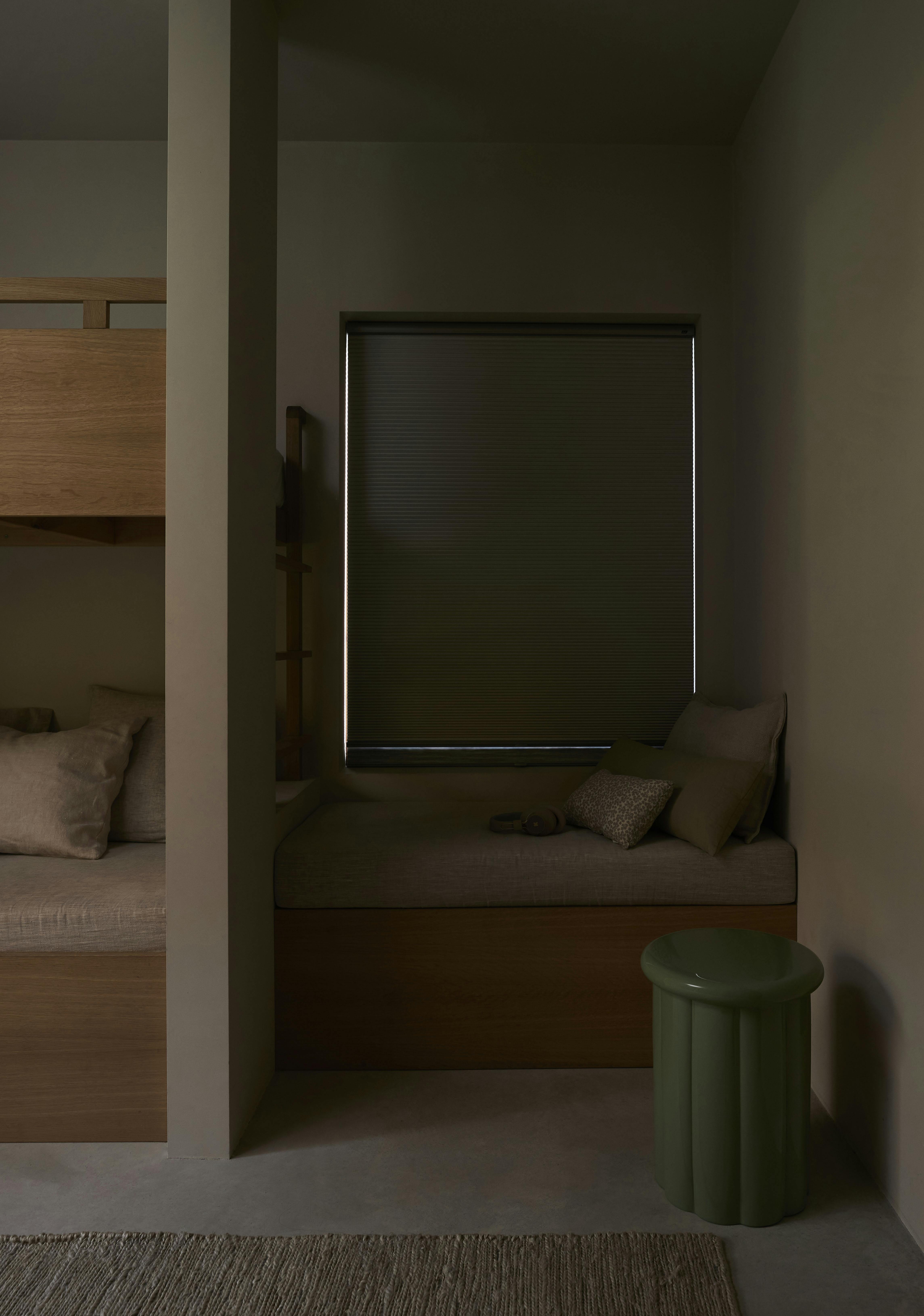 Grey duette shades in a kids bedroom