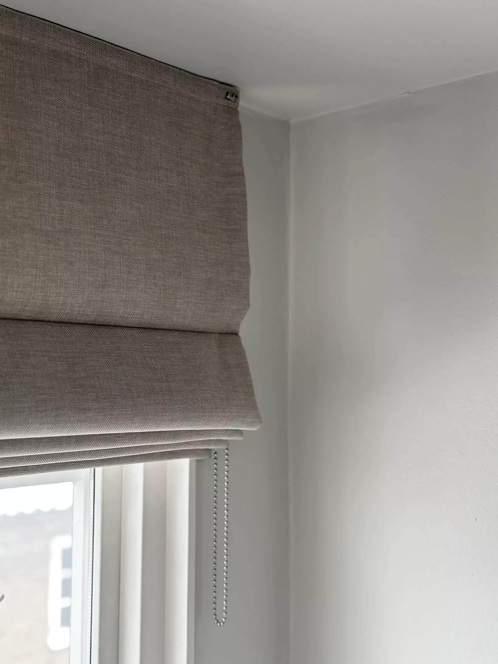 Beige roman blinds 
