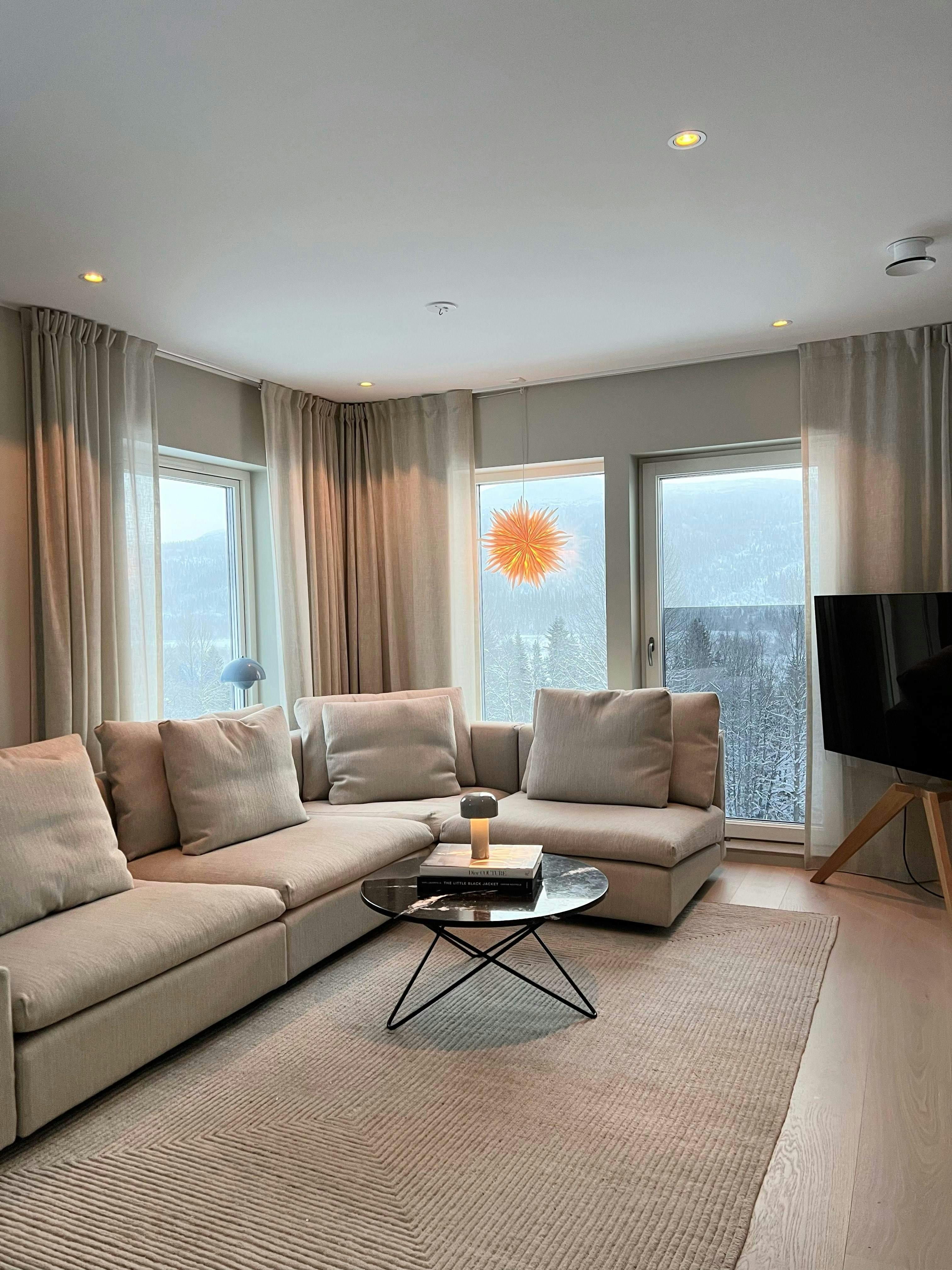 Cream curtains in a living room 