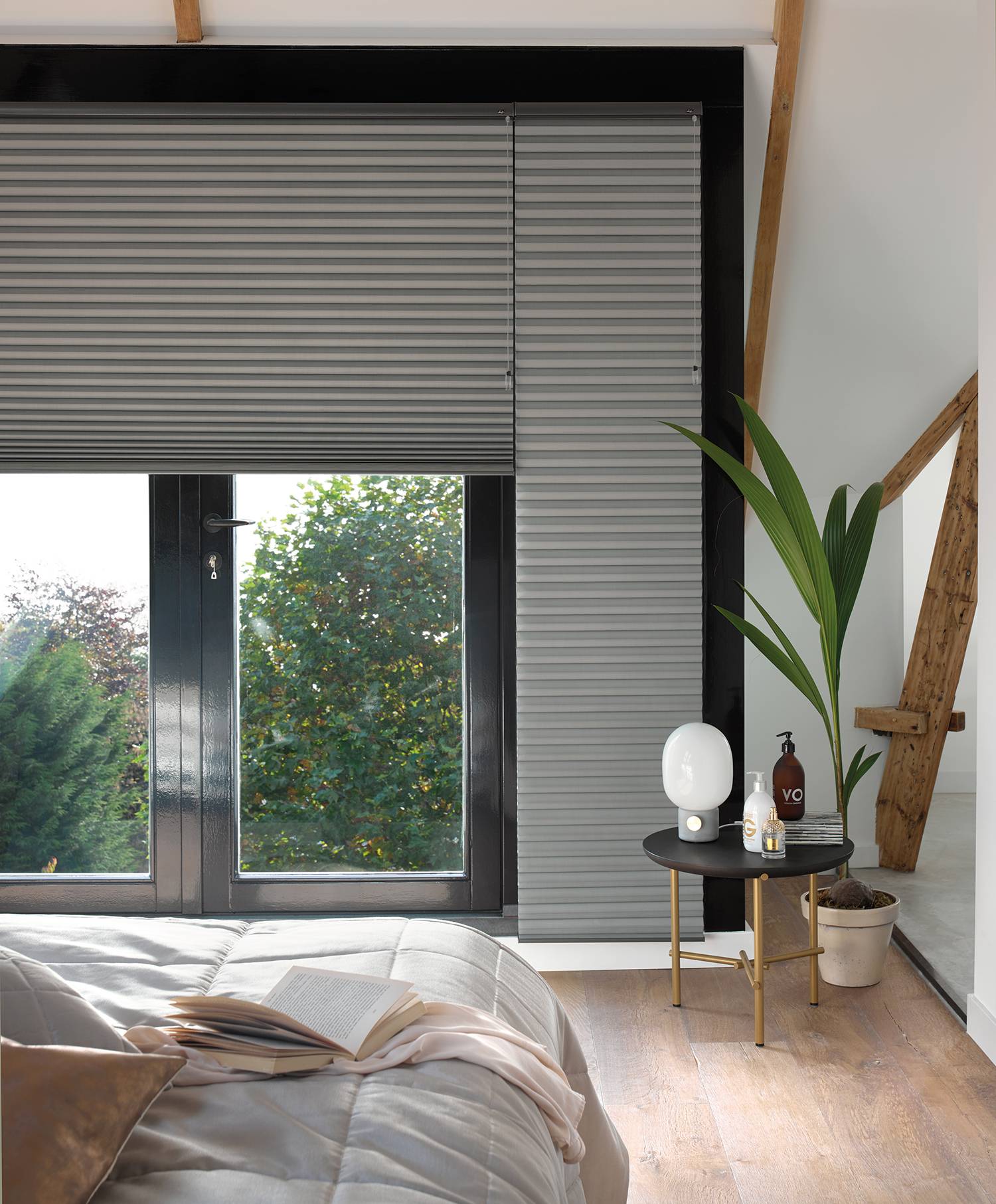 Grey duette shades in a bedroom