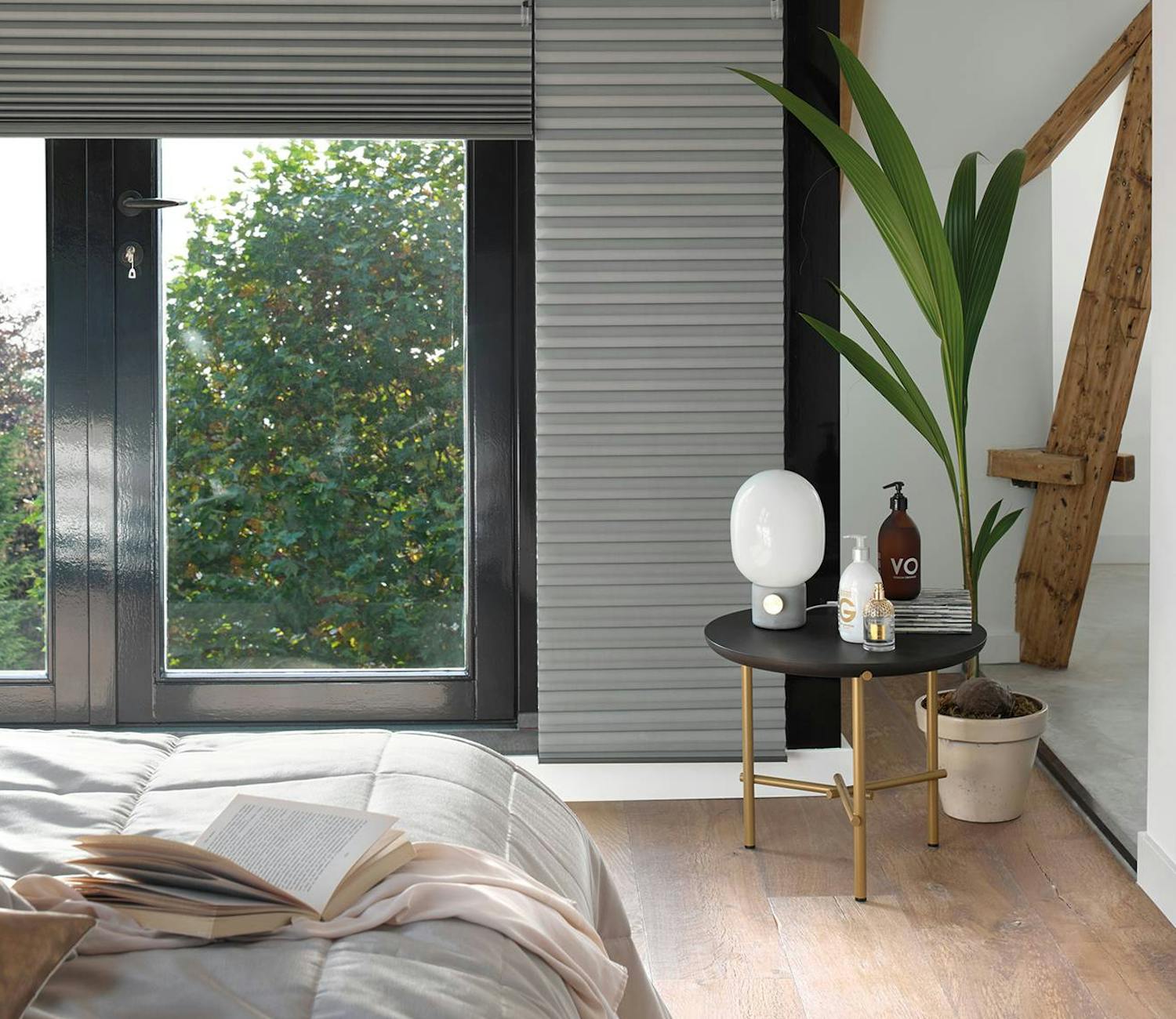 Grey duette shades in a bedroom