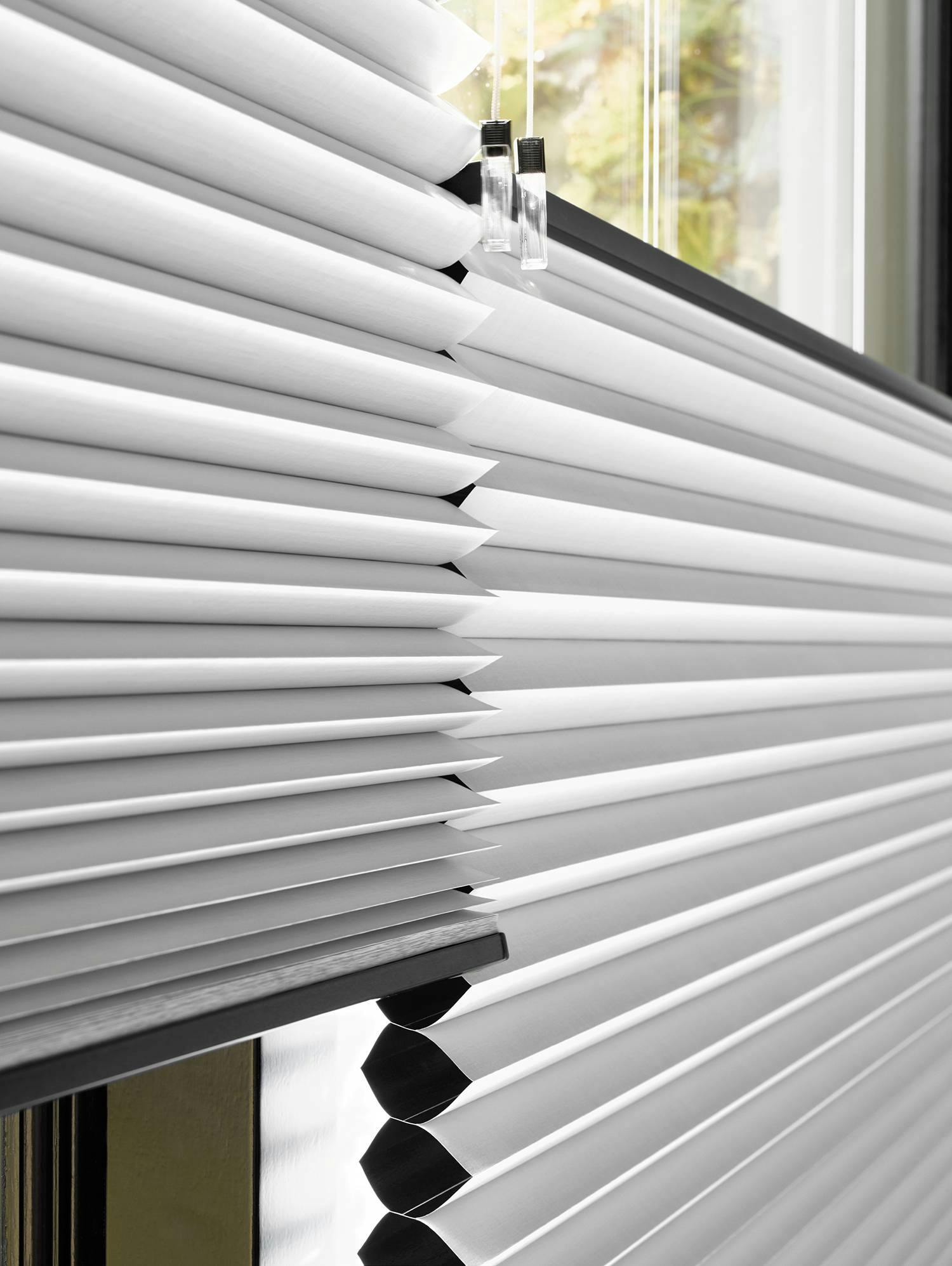 Closeup of silver duette shades