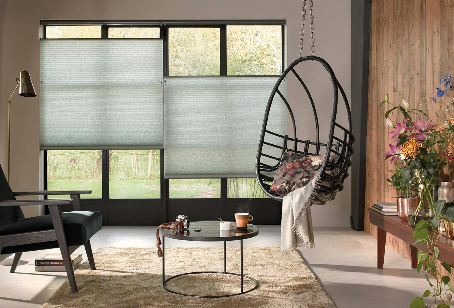 Light green duette shades in a living room