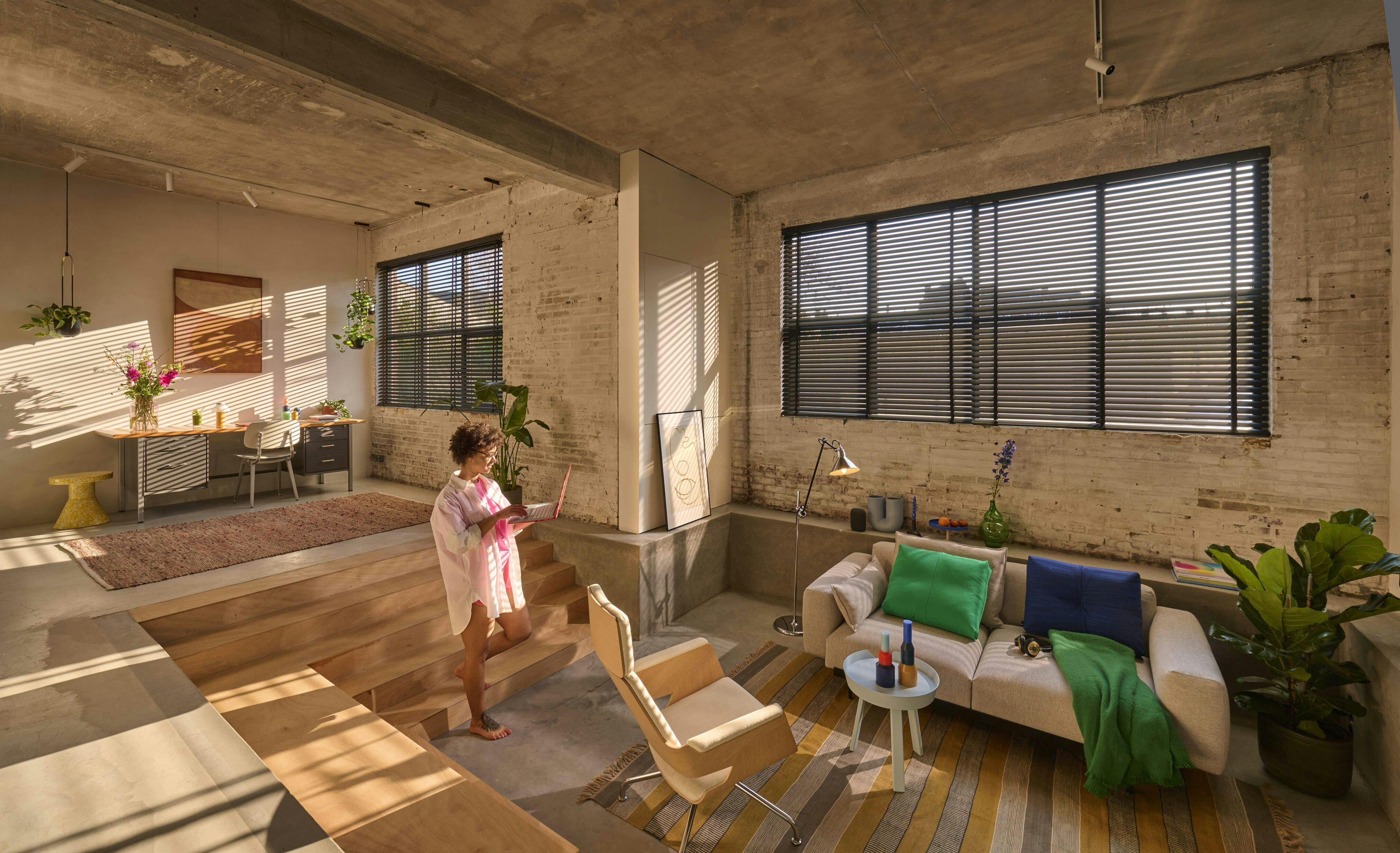 Black venetian blinds in a living room