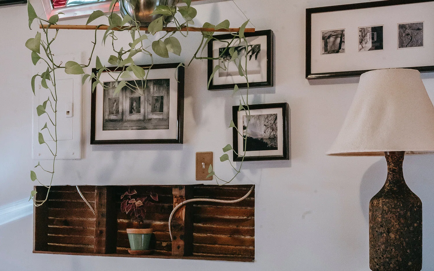 White wall with pictures on it