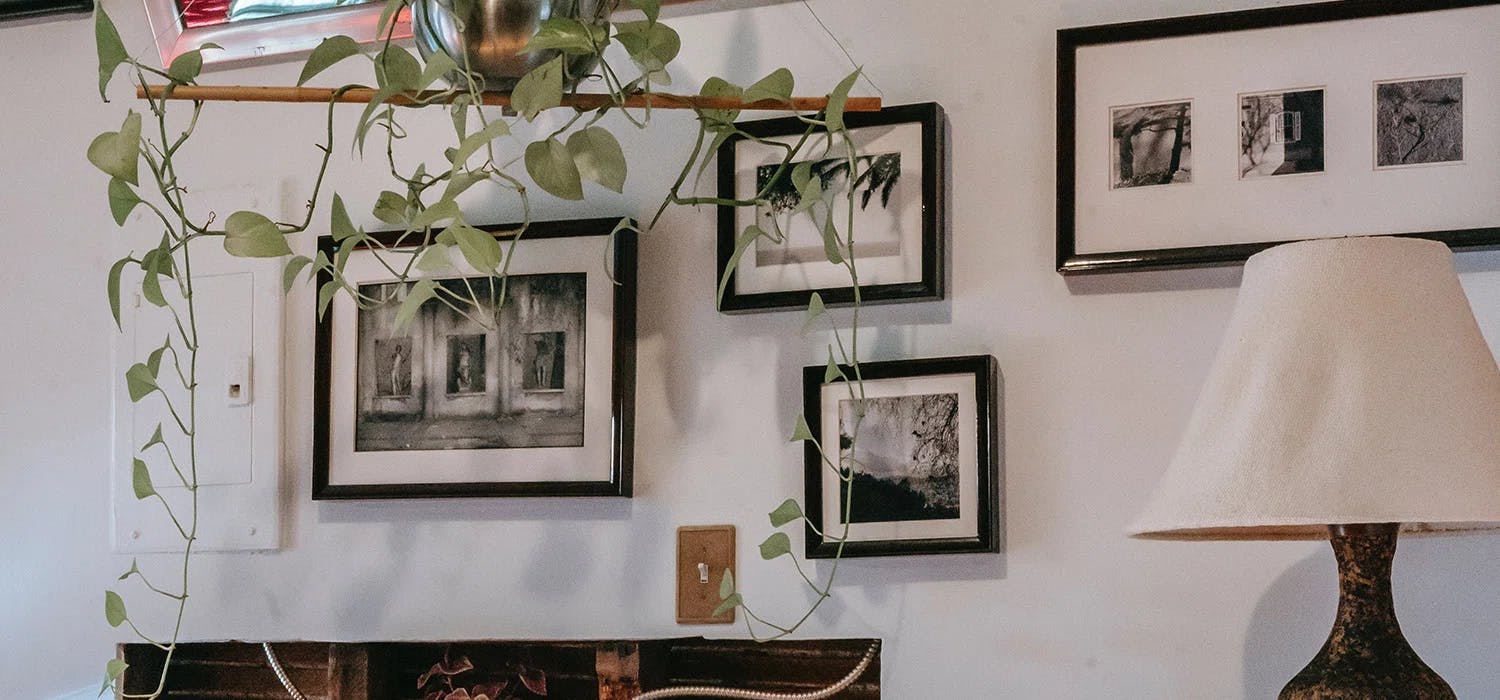 White wall with pictures on it