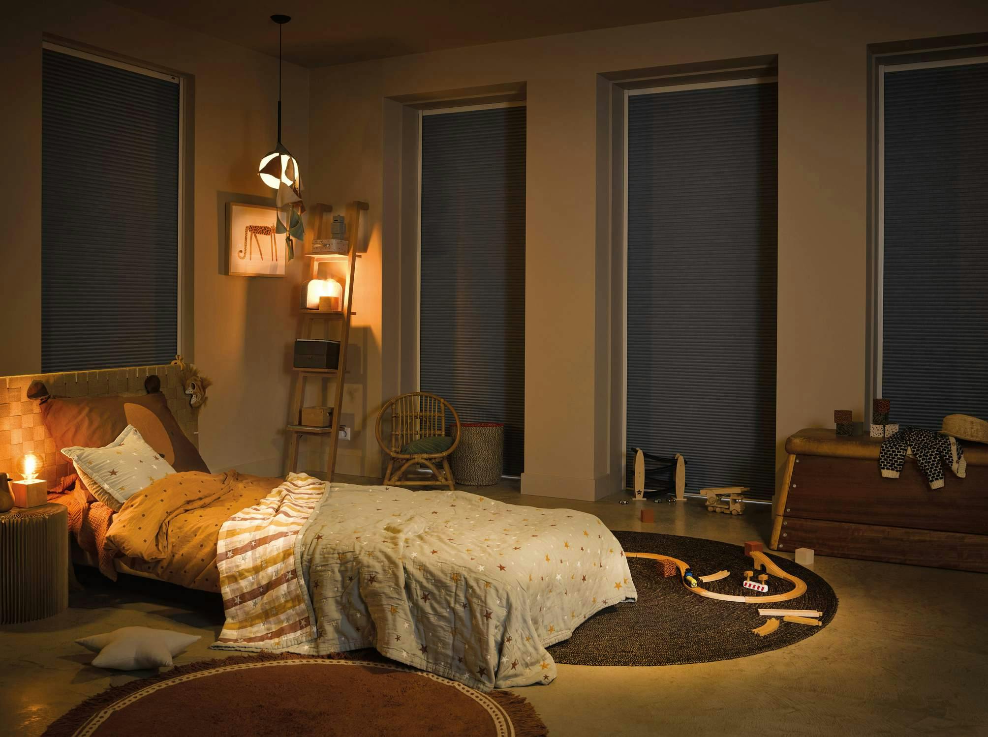 Dark blue duette shades lightlock in a kids room 