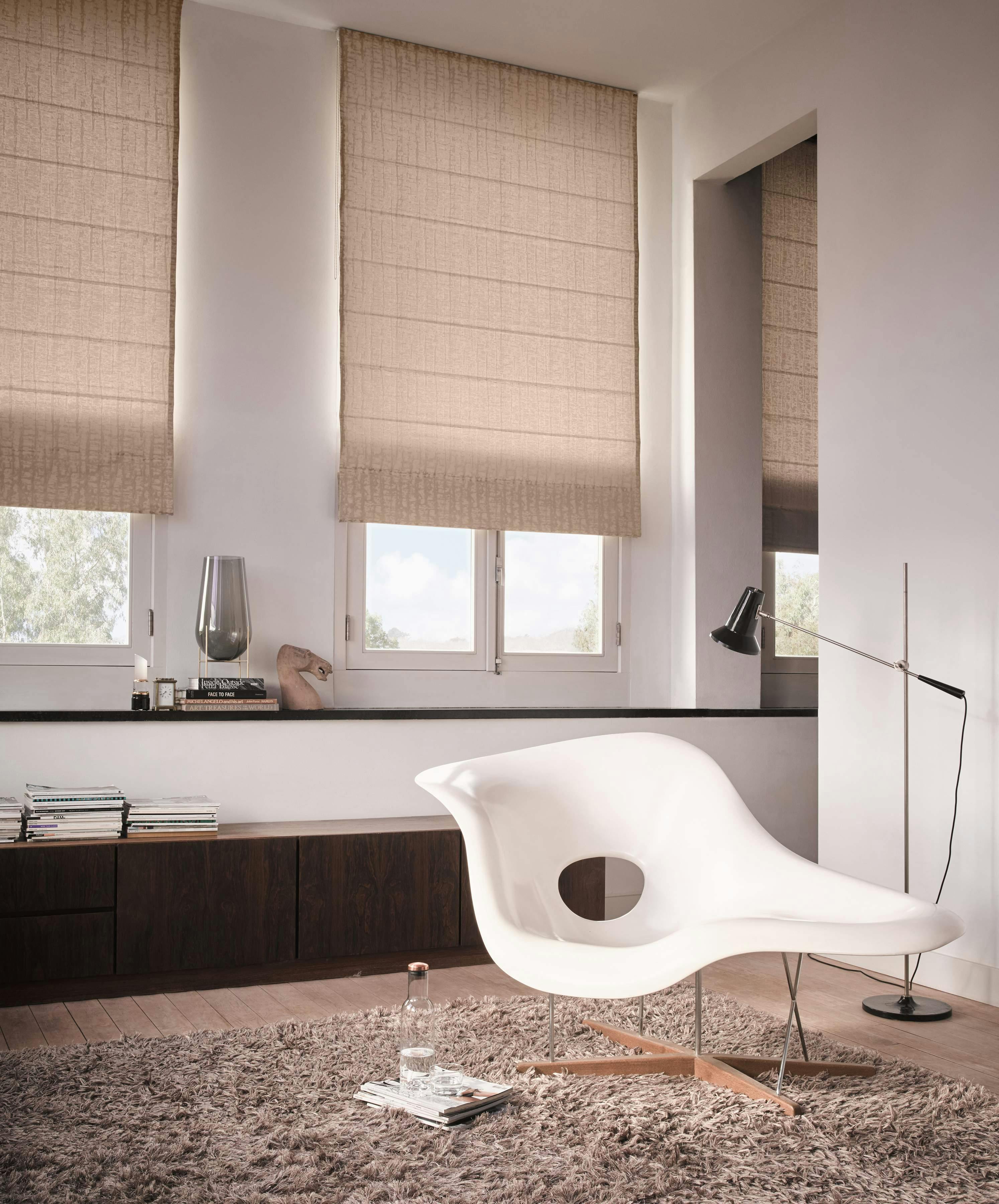 Cream roman blinds in a living room