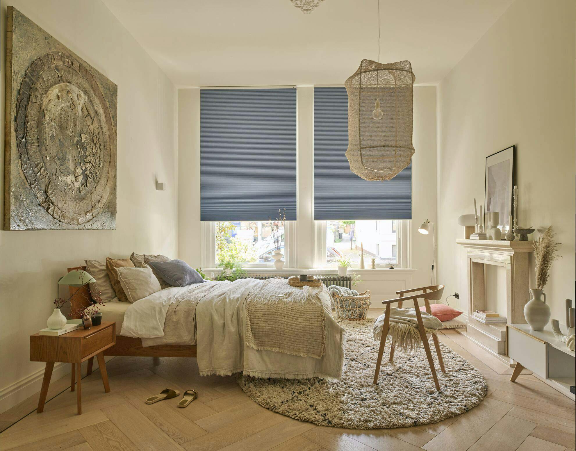 Blue duette shades in a bedroom 
