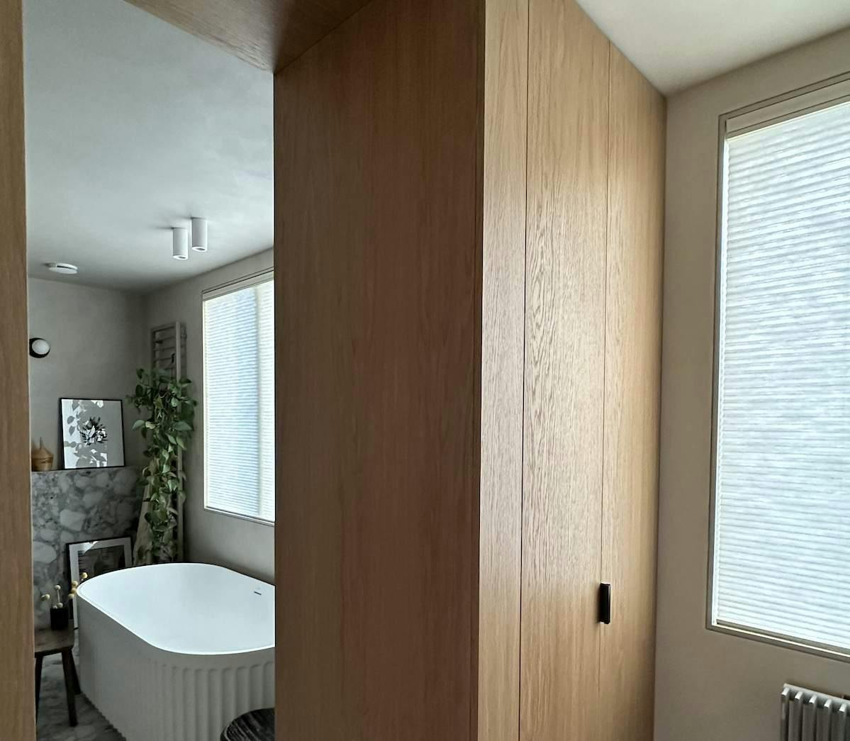 White duette shades in a bathroom on a real home