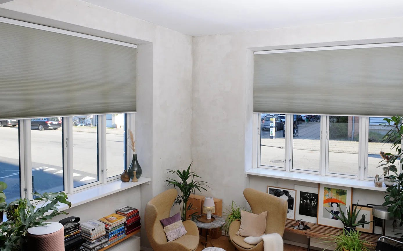 Grey duette shades in a living room 