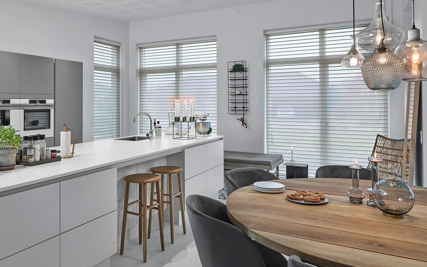Silhouette shades in a modern kitchen and dining room