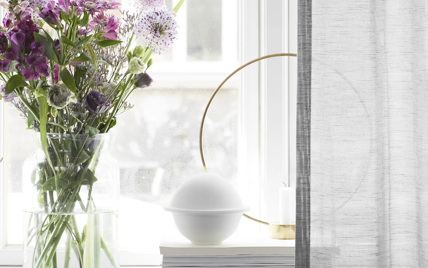 Semi-transparent white curtains on a window