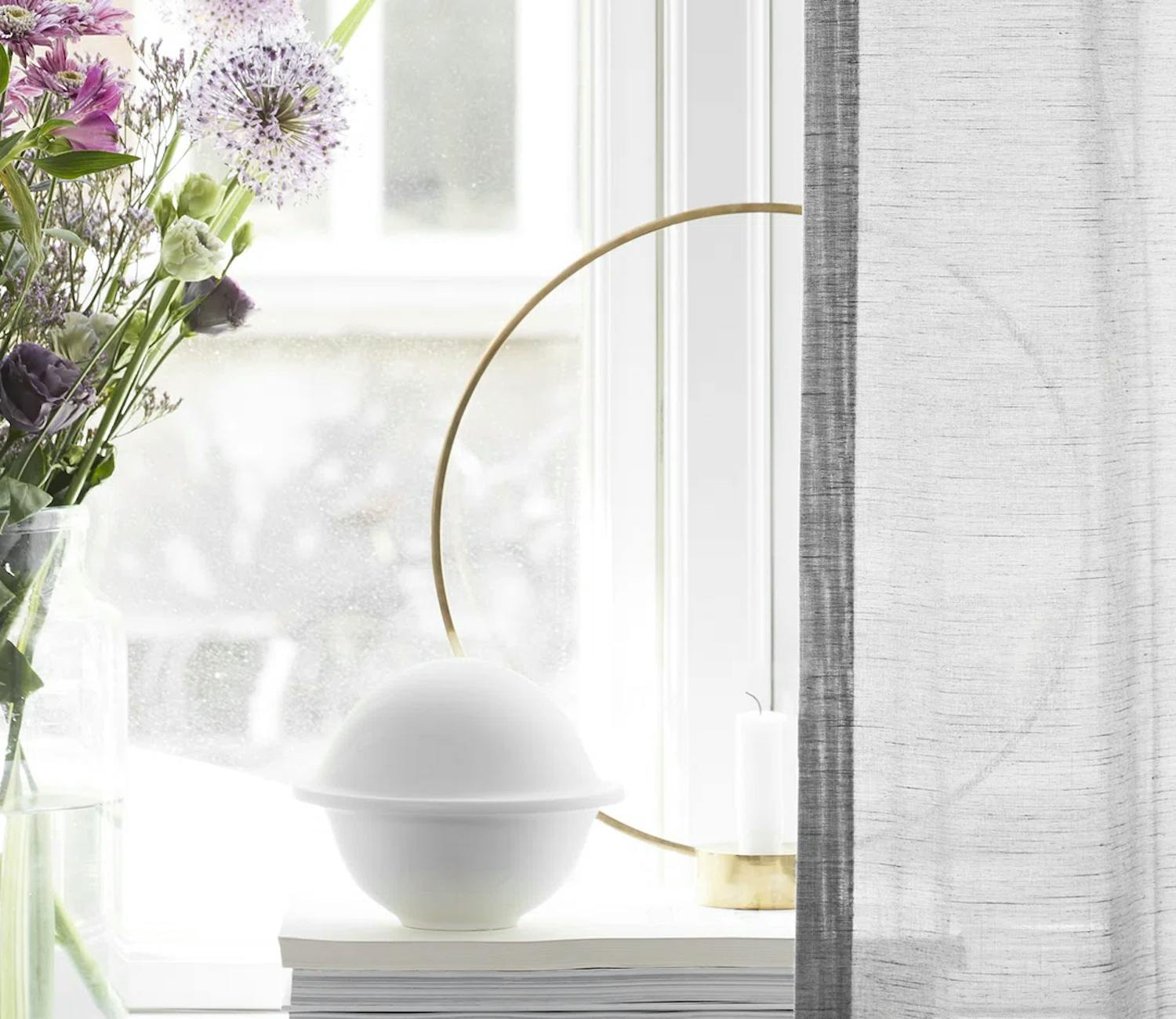 Semi-transparent white curtains on a window