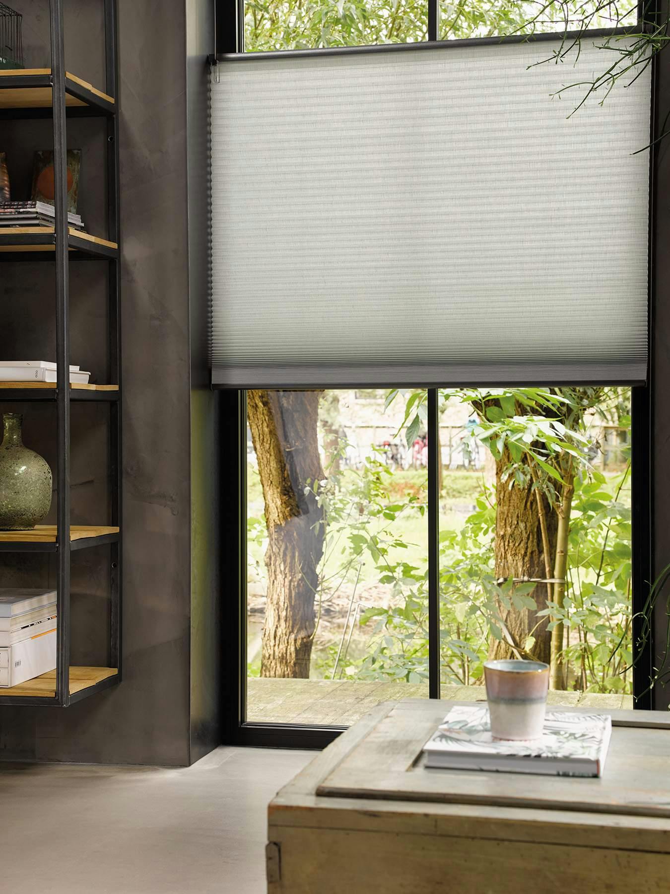 Green duette shade over tall patio doors