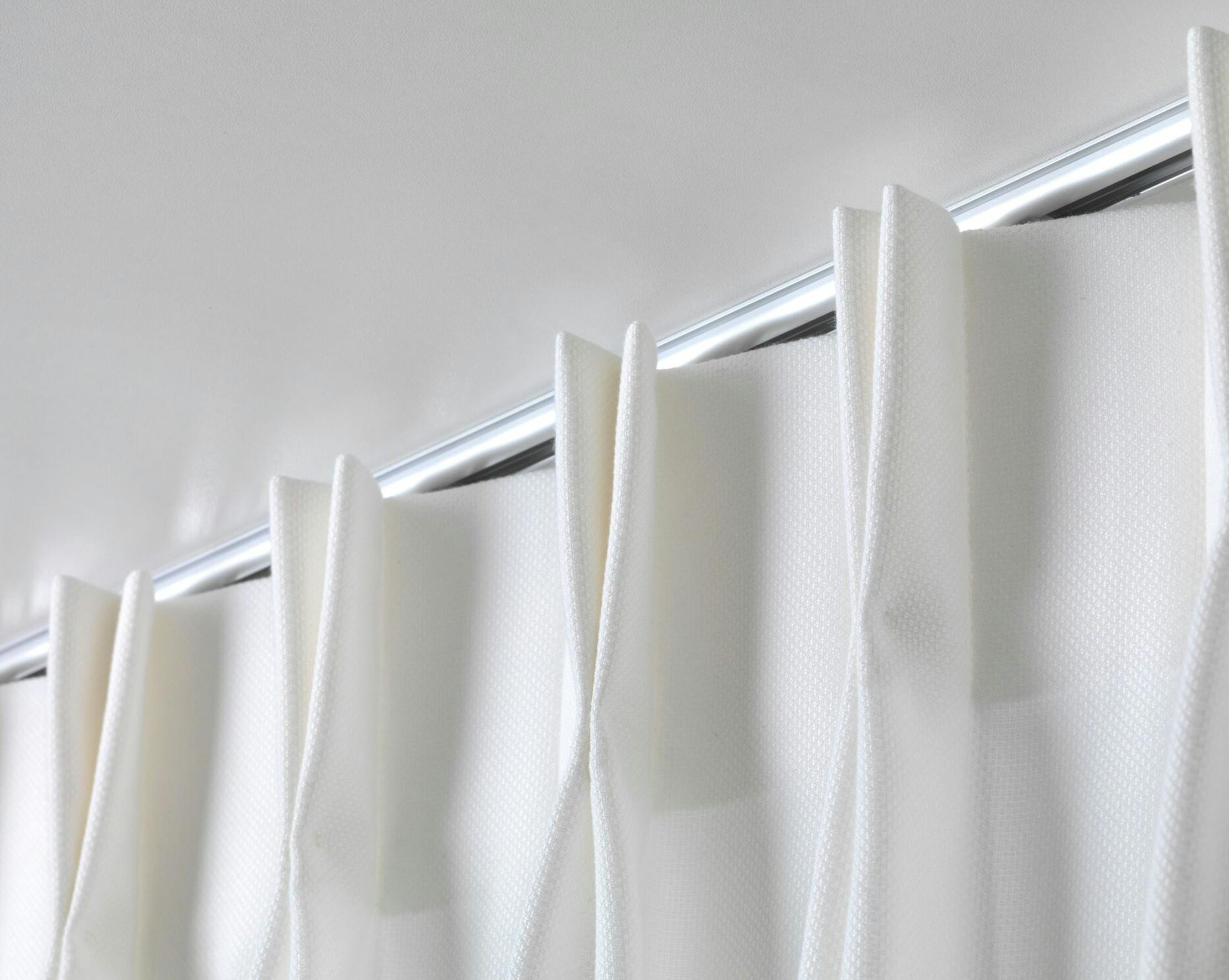 Double return pleat white curtain
