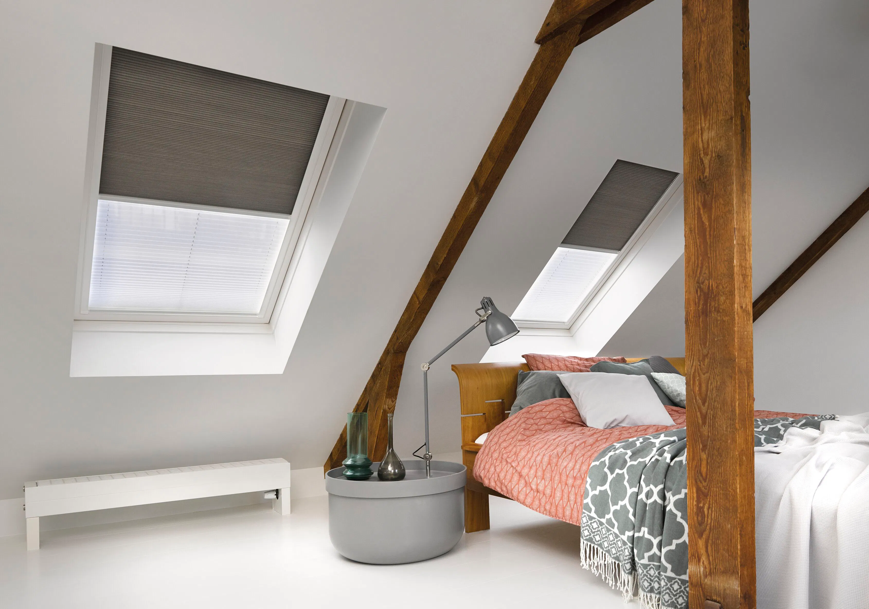 Dark grey and white day and night duette pleated blinds on bedroom windows