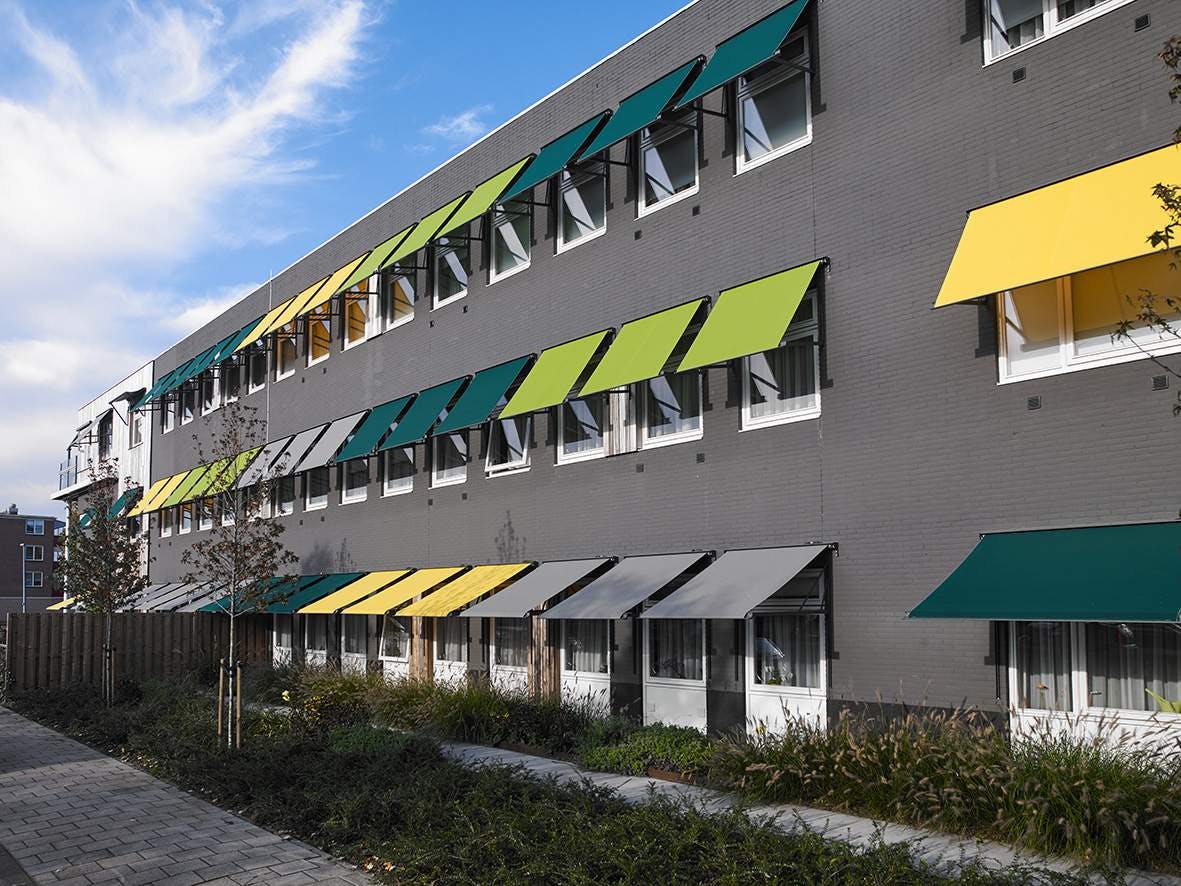 Carré uitvalscherm in geel, groen en grijs