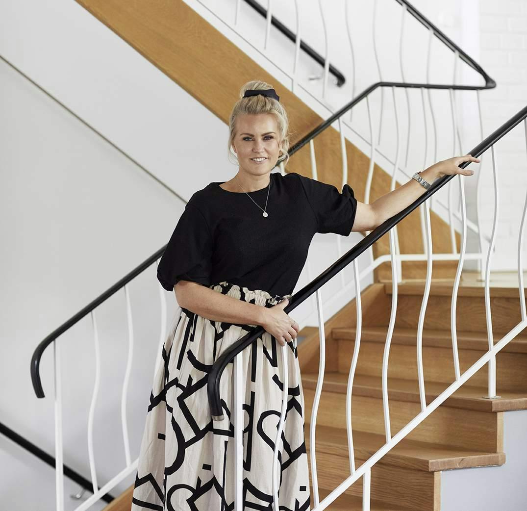 Frida Fahrman standing on a staircase