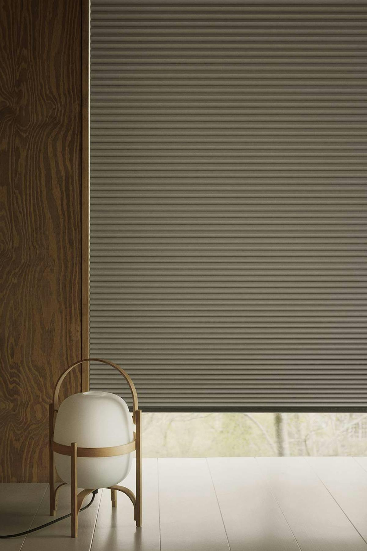 Duette powerview blinds covering floor to ceiling windows