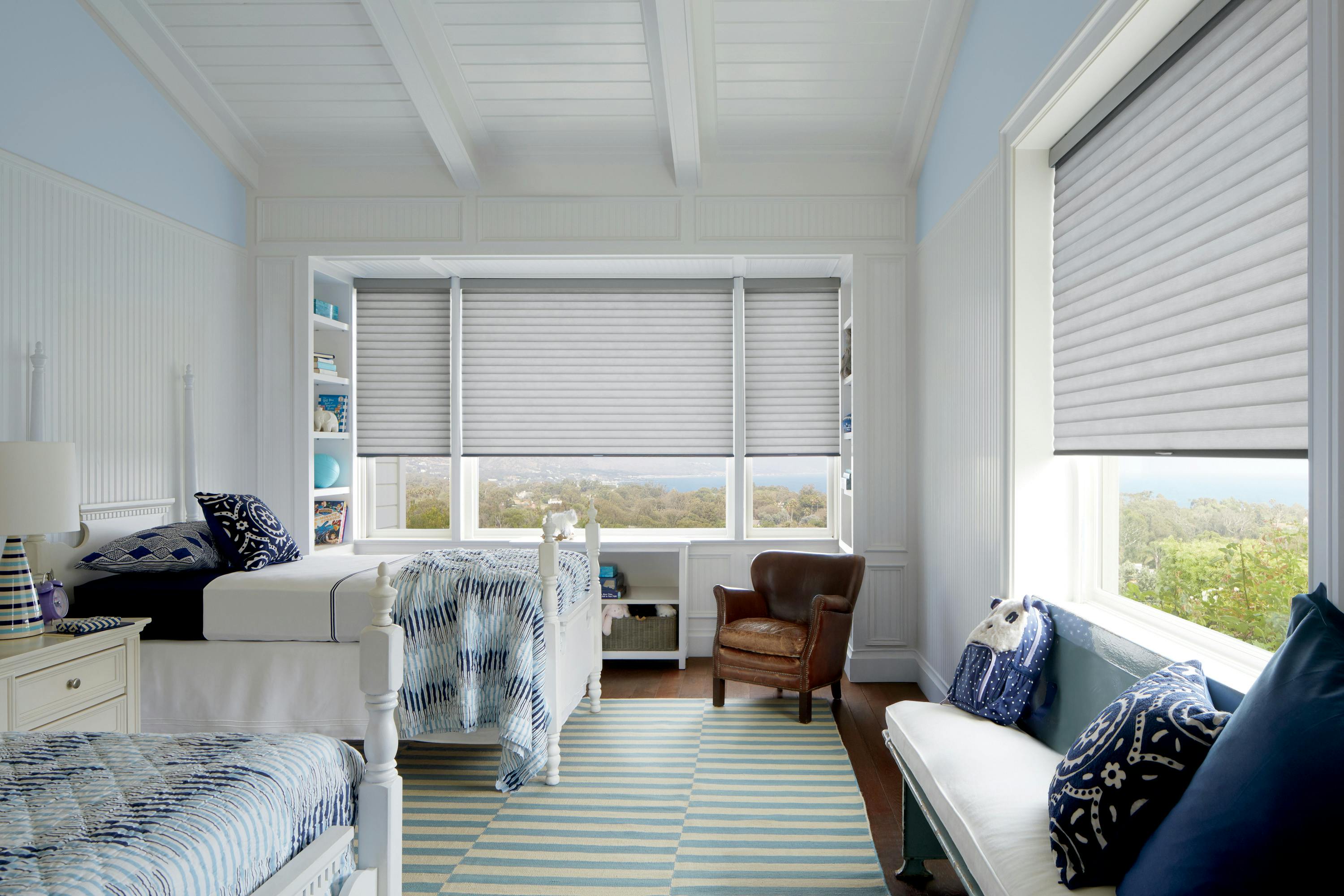 Grey Sonnette blinds half open in two children's bedroom