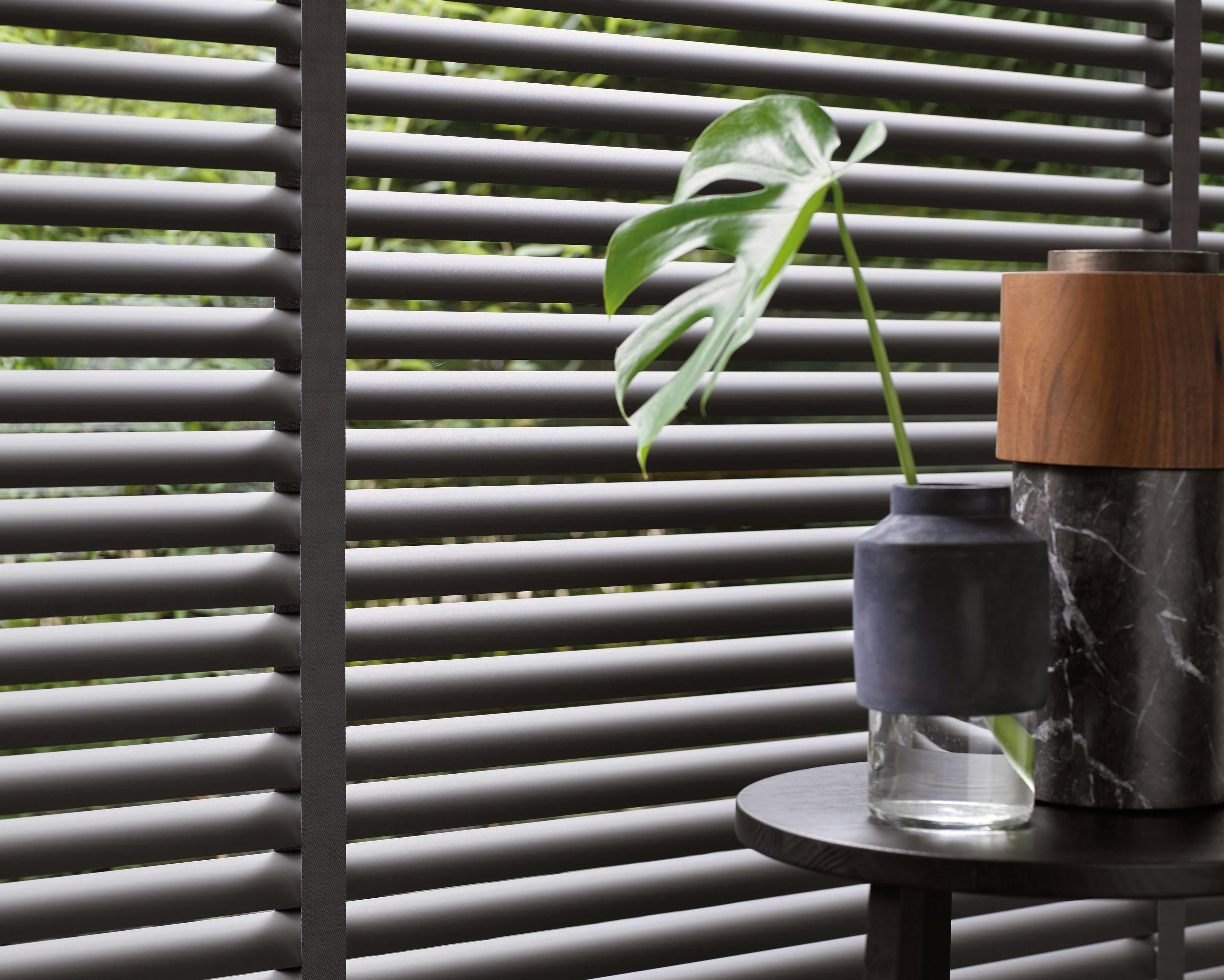 Close up of black venetian blinds