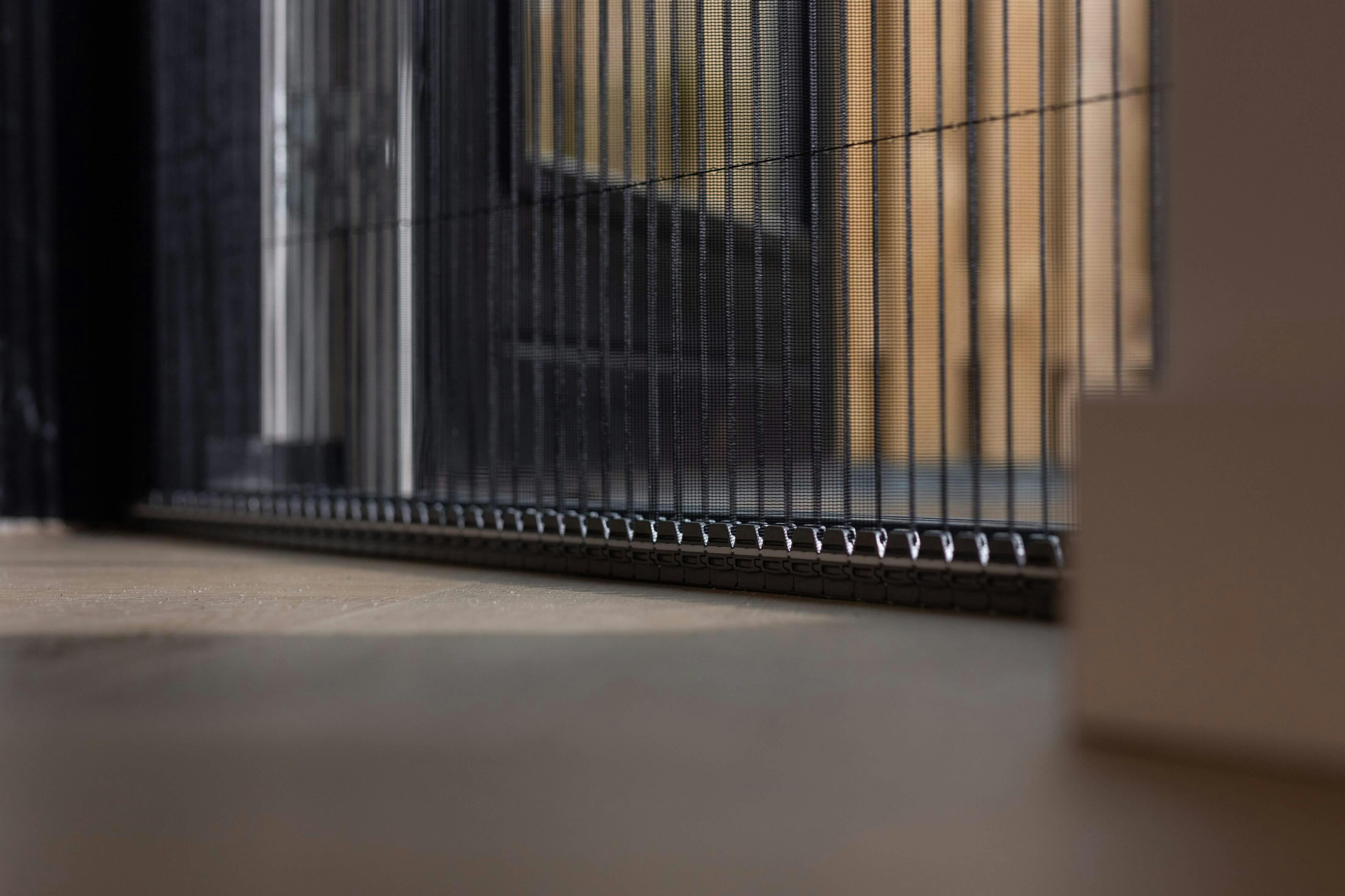 Closeup of pleated screen door