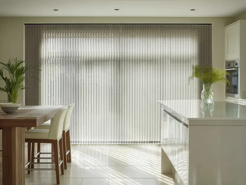Light brown vertical blinds on bifold doors in a open dining and kitchen area 