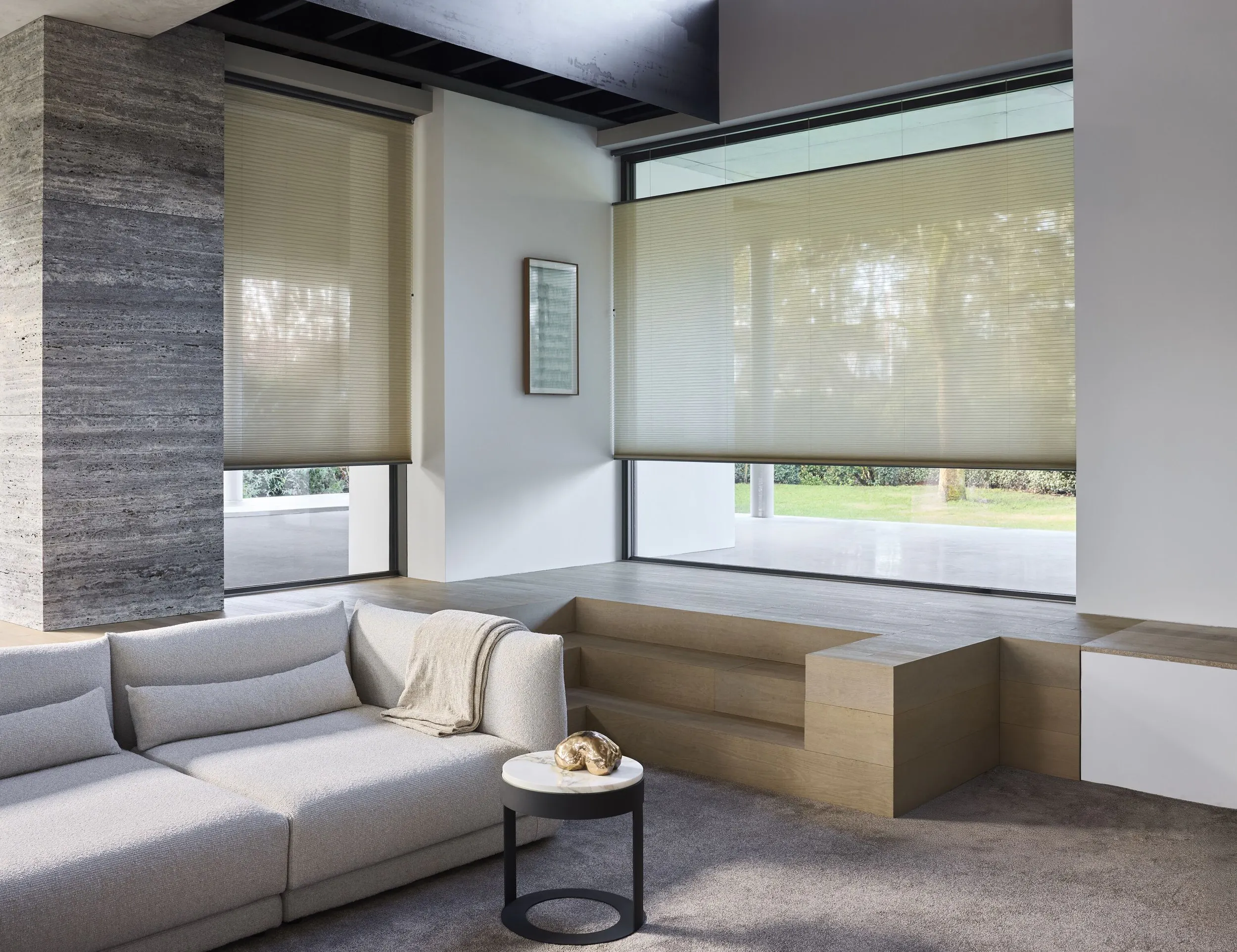 Yellow Duette® shades on windows in a living room