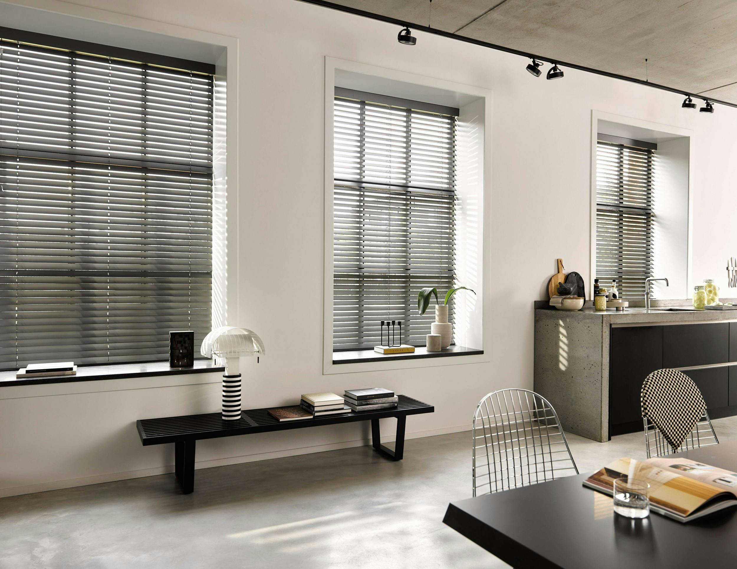 Kitchen with black venetian blinds