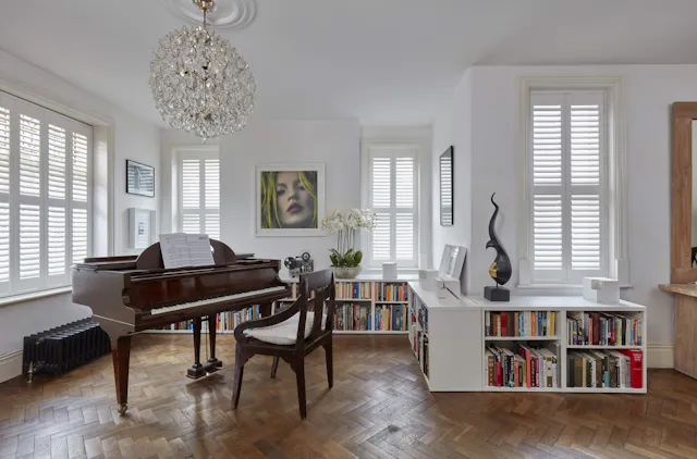 Living room with white shutters