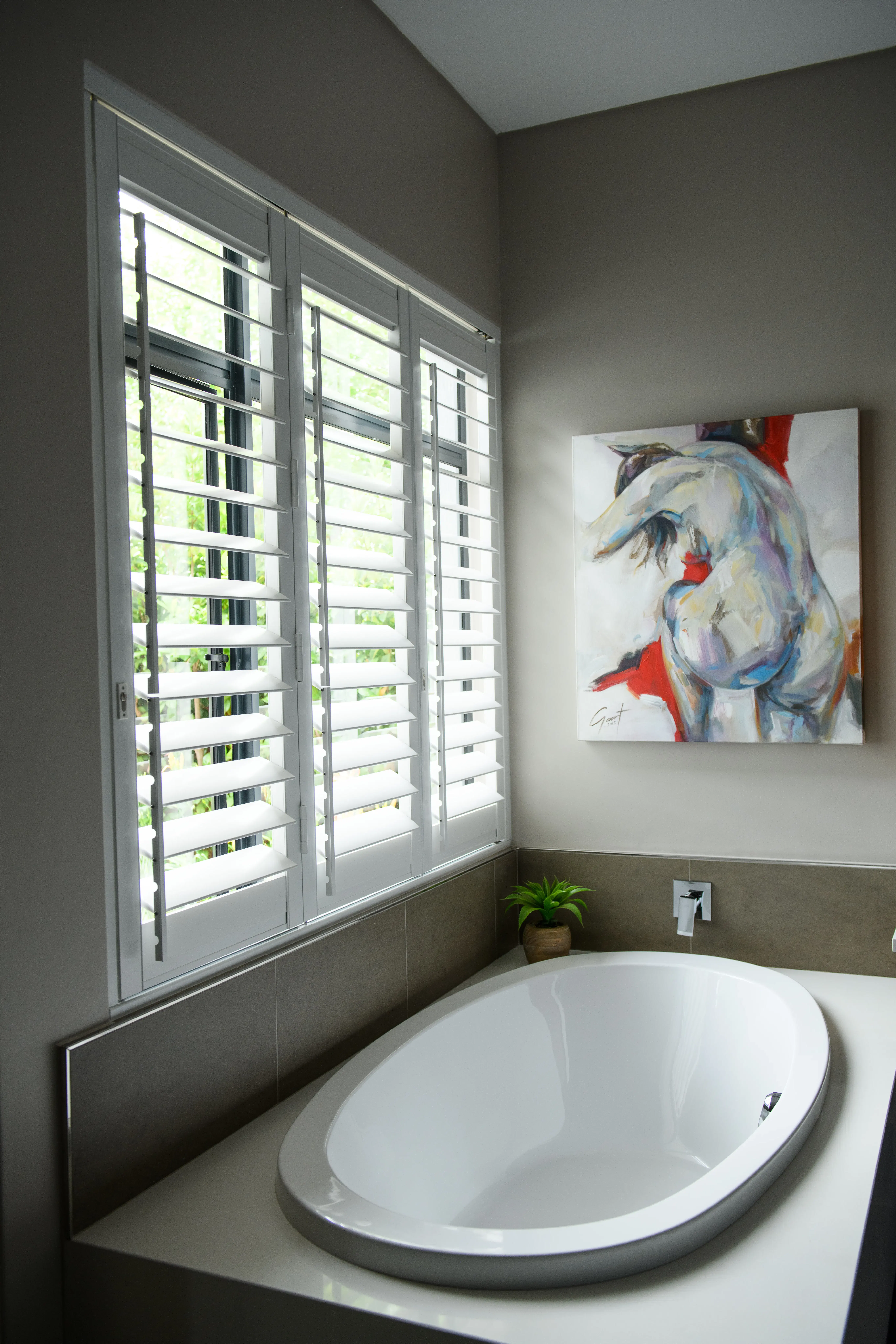 White shutters in a bathroom 