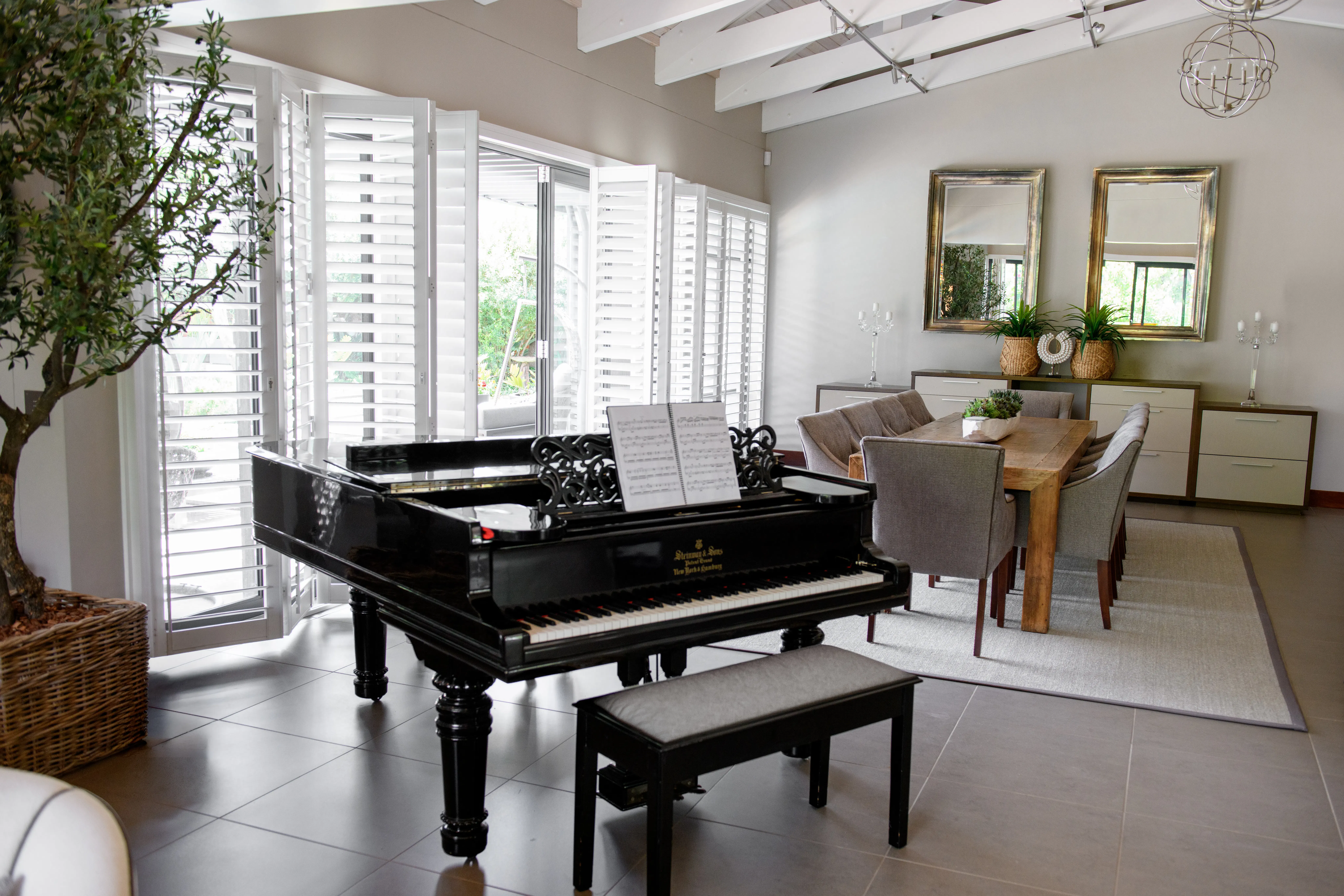 ShutterX white bifold shutter in a living room